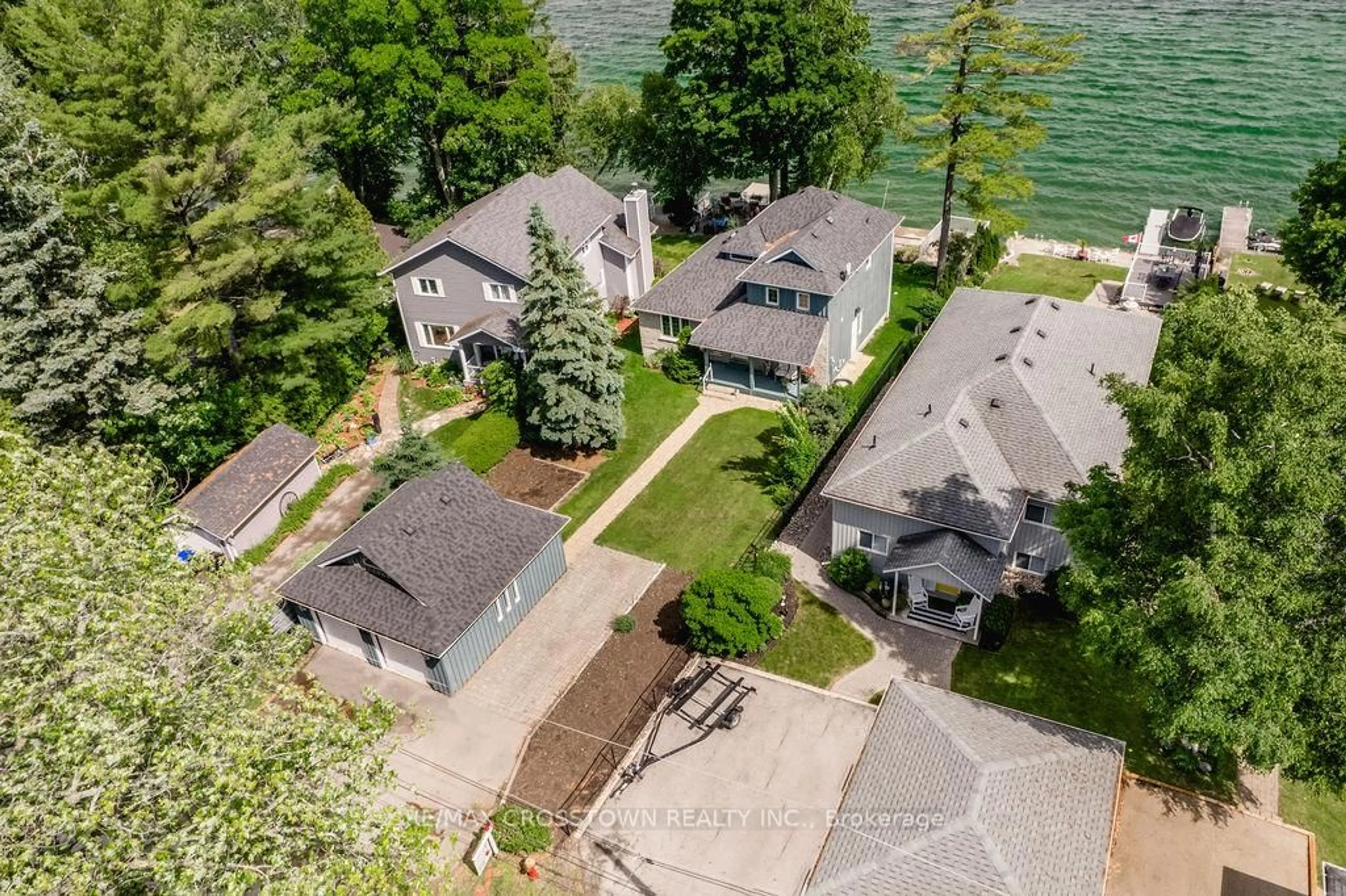 A pic from outside/outdoor area/front of a property/back of a property/a pic from drone, water/lake/river/ocean view for 665 Lakelands Ave, Innisfil Ontario L9S 4E5