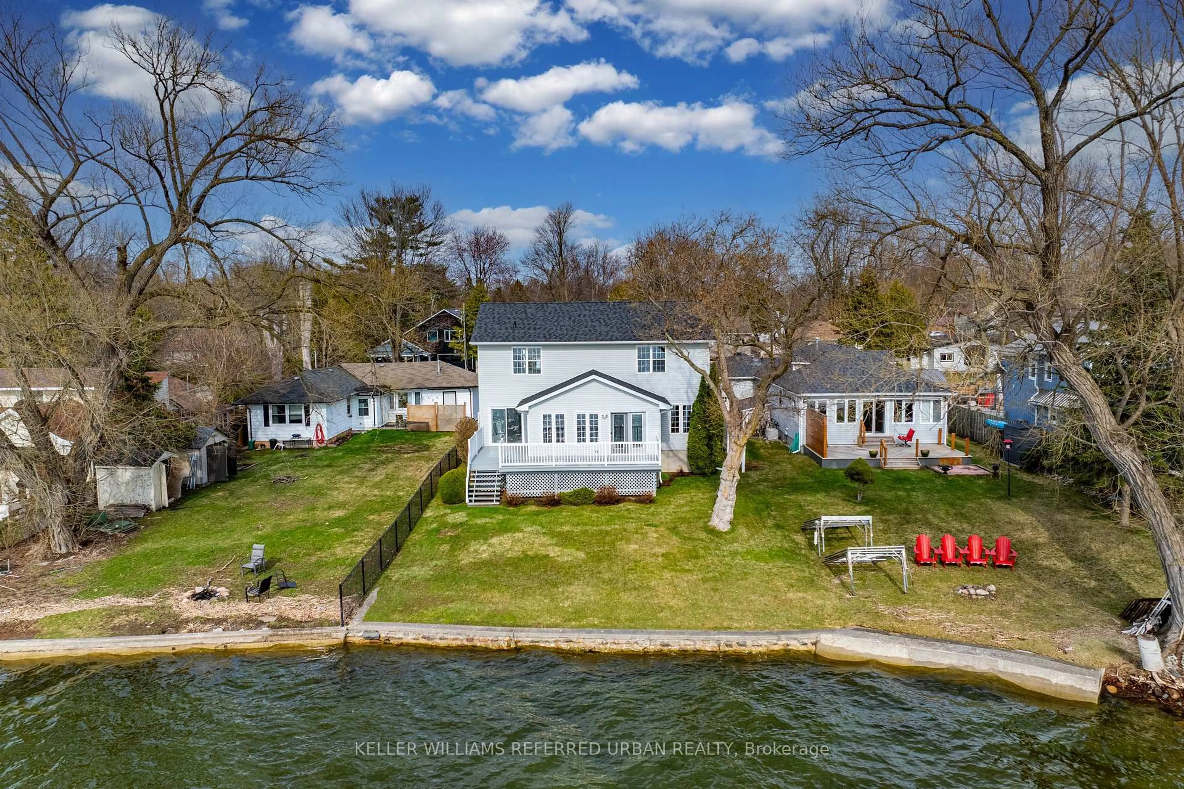A pic from outside/outdoor area/front of a property/back of a property/a pic from drone, water/lake/river/ocean view for 259 Pleasant Blvd, Georgina Ontario L4P 2S7
