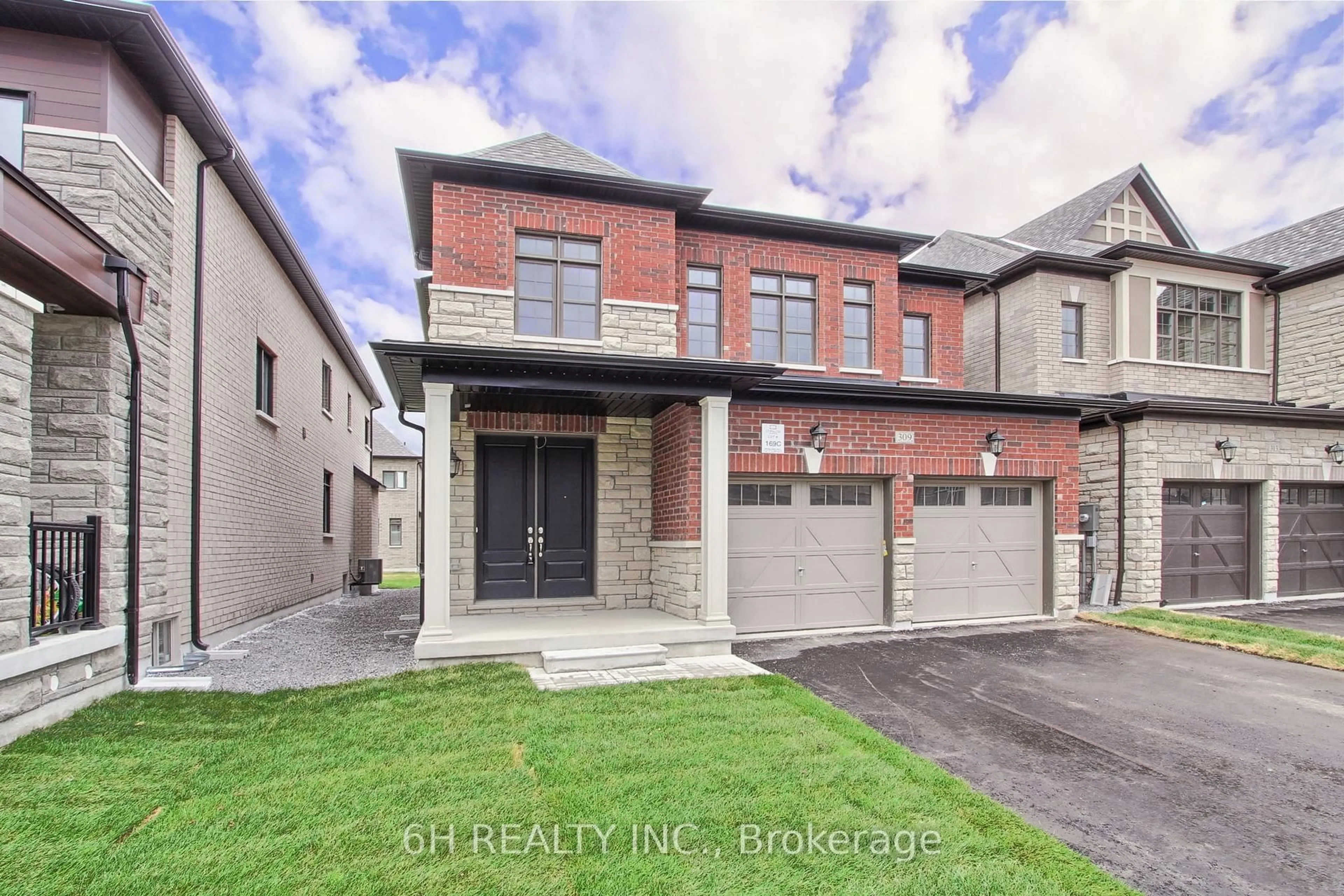 Home with brick exterior material, street for 309 Boundary Blvd, Whitchurch-Stouffville Ontario L4A 5E2