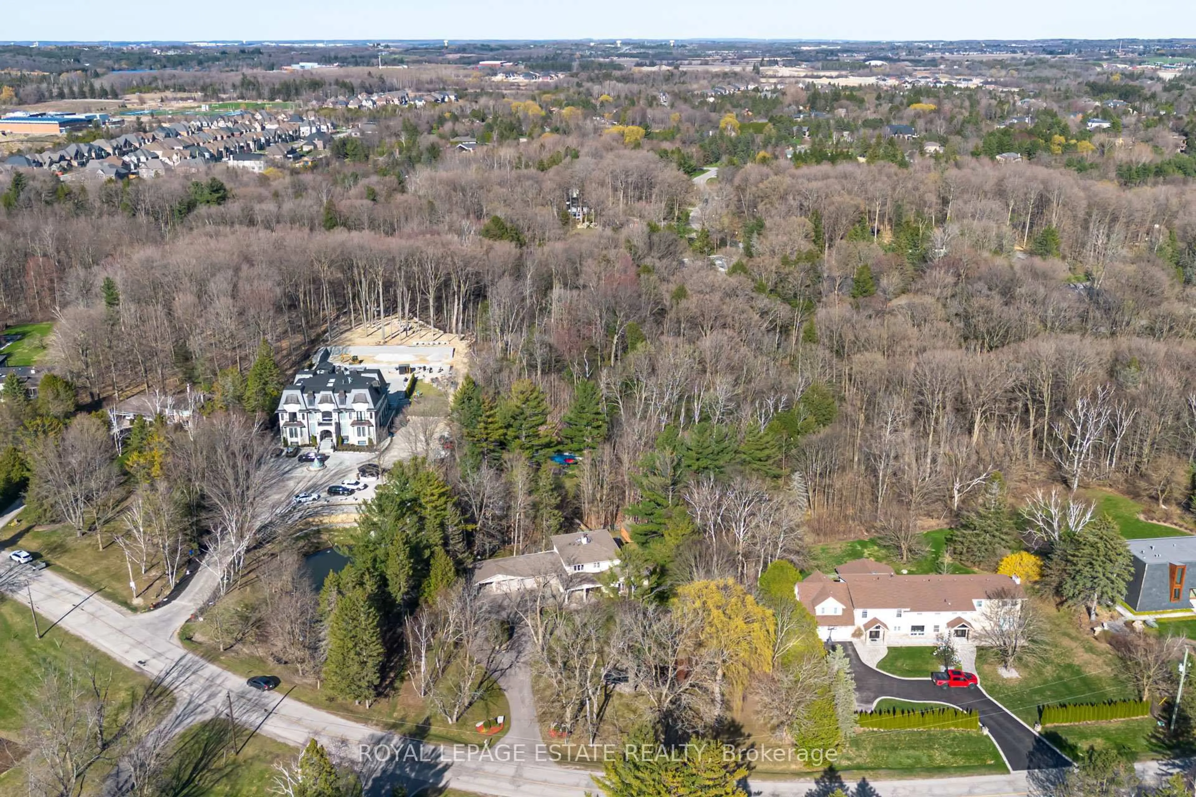 A pic from outside/outdoor area/front of a property/back of a property/a pic from drone, unknown for 65 Watch Hill Rd, King Ontario L7B 1K1