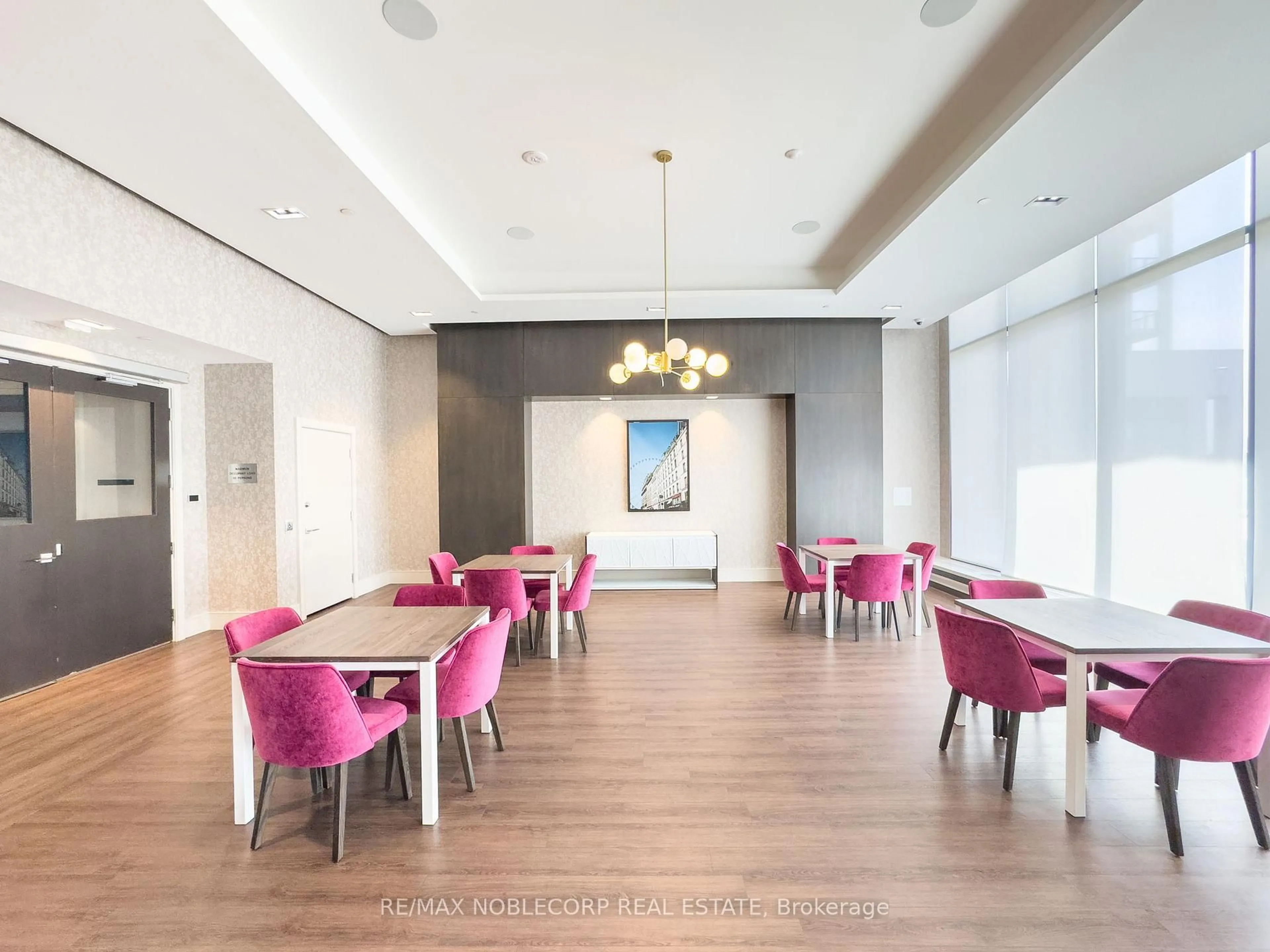 Dining room, wood/laminate floor for 9000 Jane St #2214, Vaughan Ontario L4K 0M6
