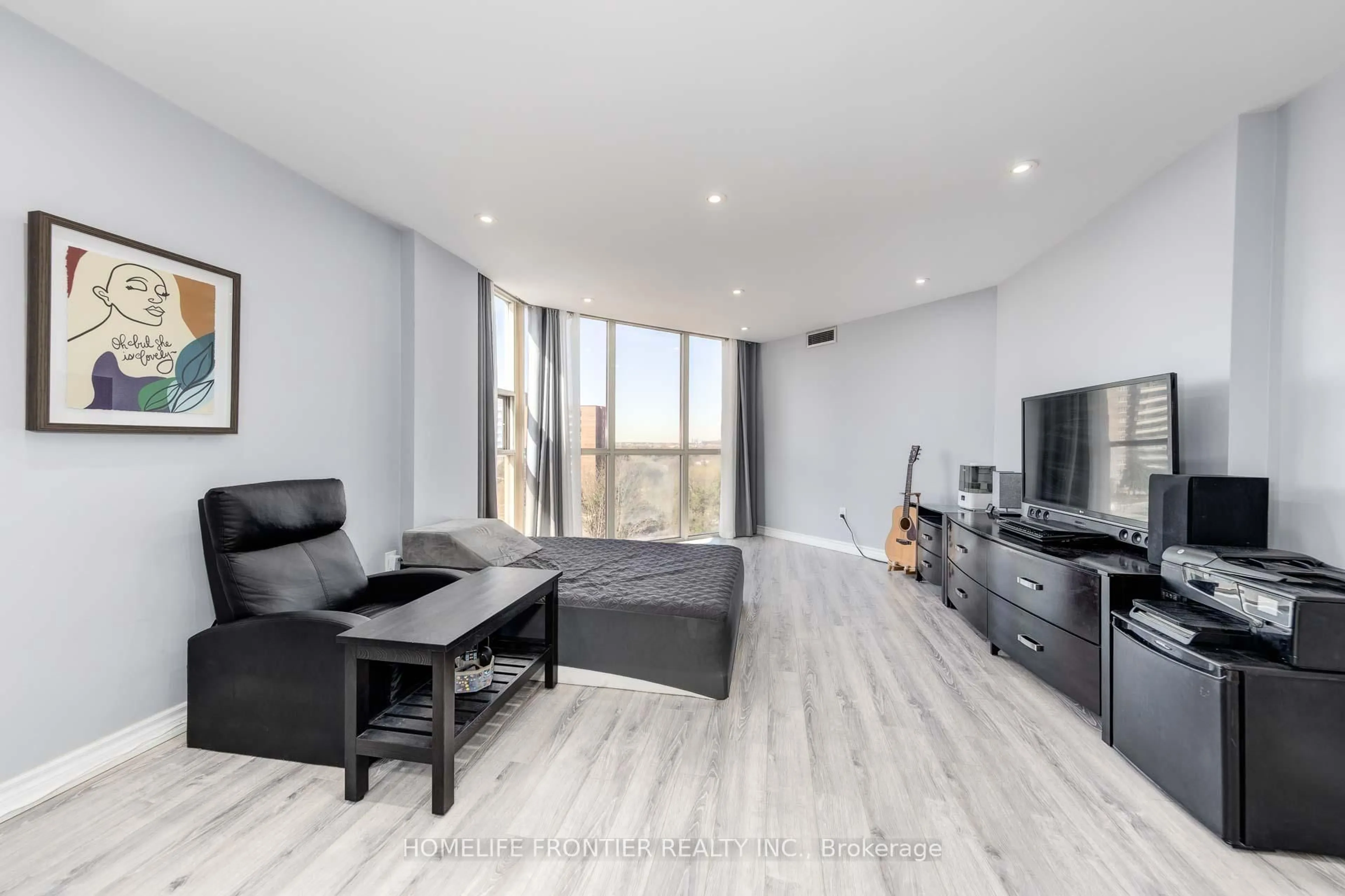 Living room with furniture, wood/laminate floor for 20 Baif Blvd #704, Richmond Hill Ontario L4C 8T1