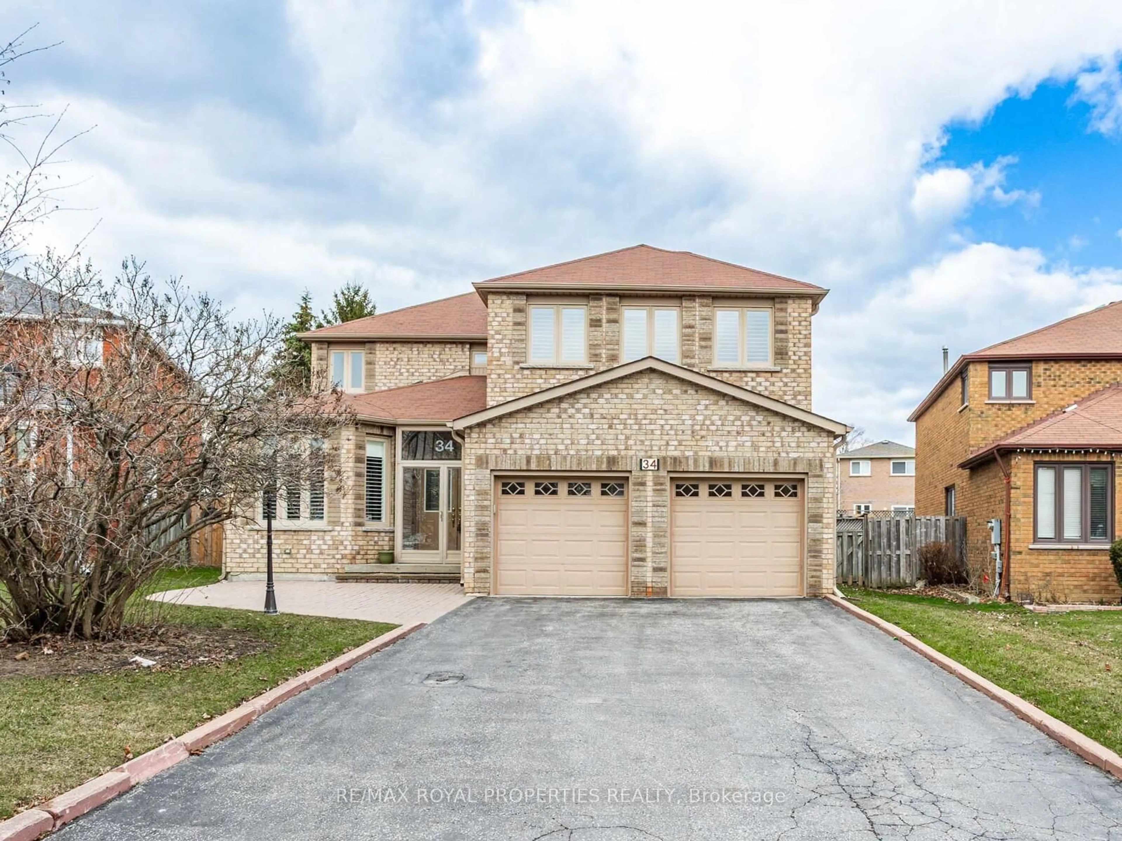 Home with brick exterior material, street for 34 Windhill Rd, Markham Ontario L3S 1P1