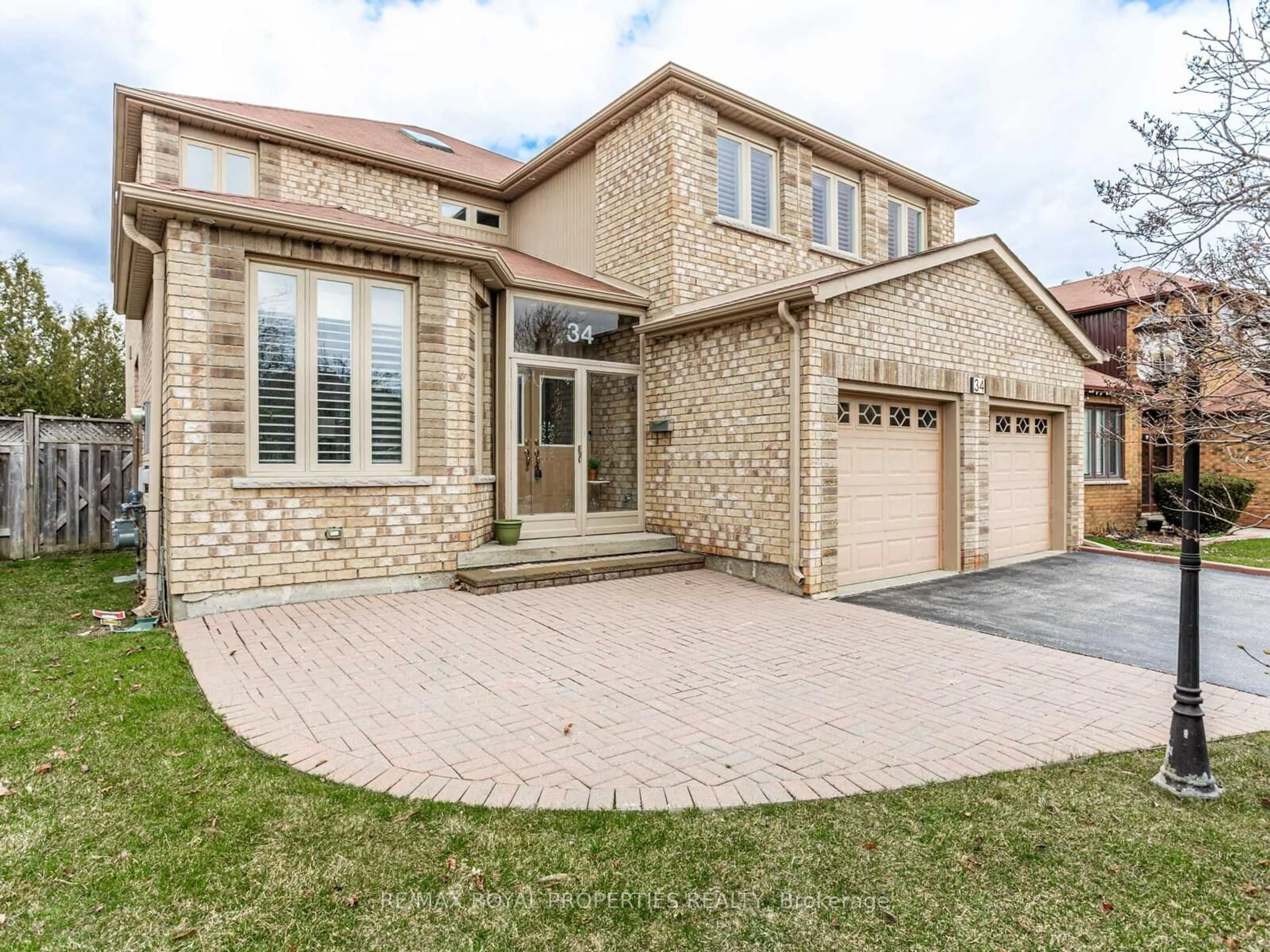 Home with brick exterior material, street for 34 Windhill Rd, Markham Ontario L3S 1P1