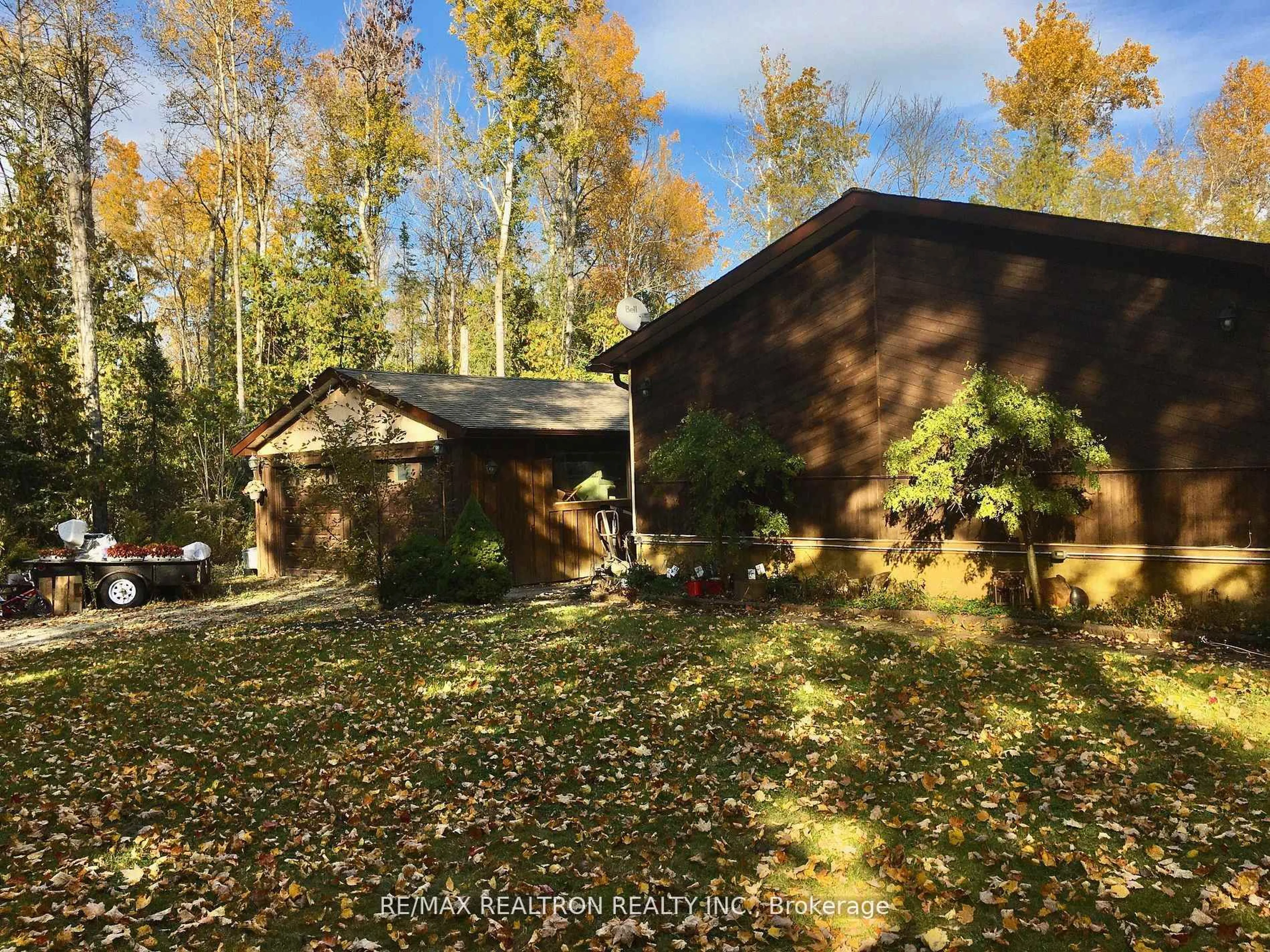 A pic from outside/outdoor area/front of a property/back of a property/a pic from drone, forest/trees view for 59 Forest Hill Dr, Adjala-Tosorontio Ontario L0M 1J0