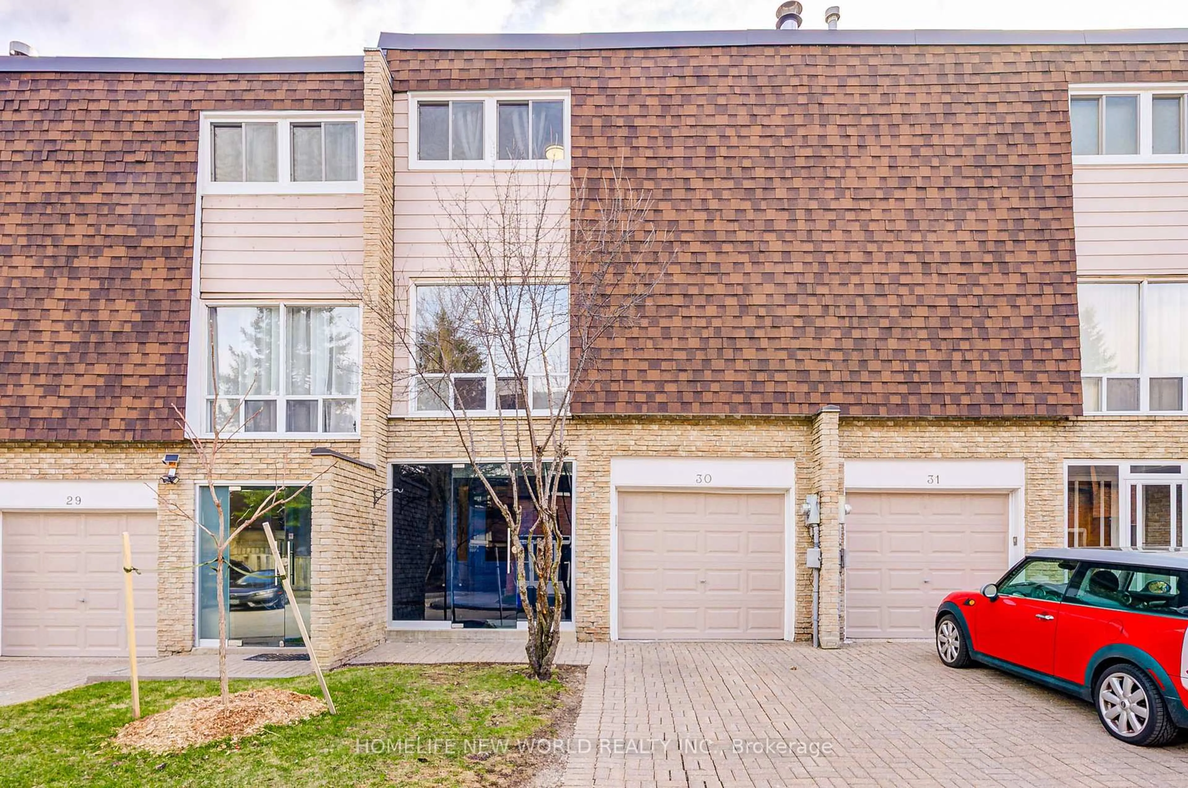 Home with brick exterior material, street for 653 Village Pkwy #30, Markham Ontario L3R 2R2
