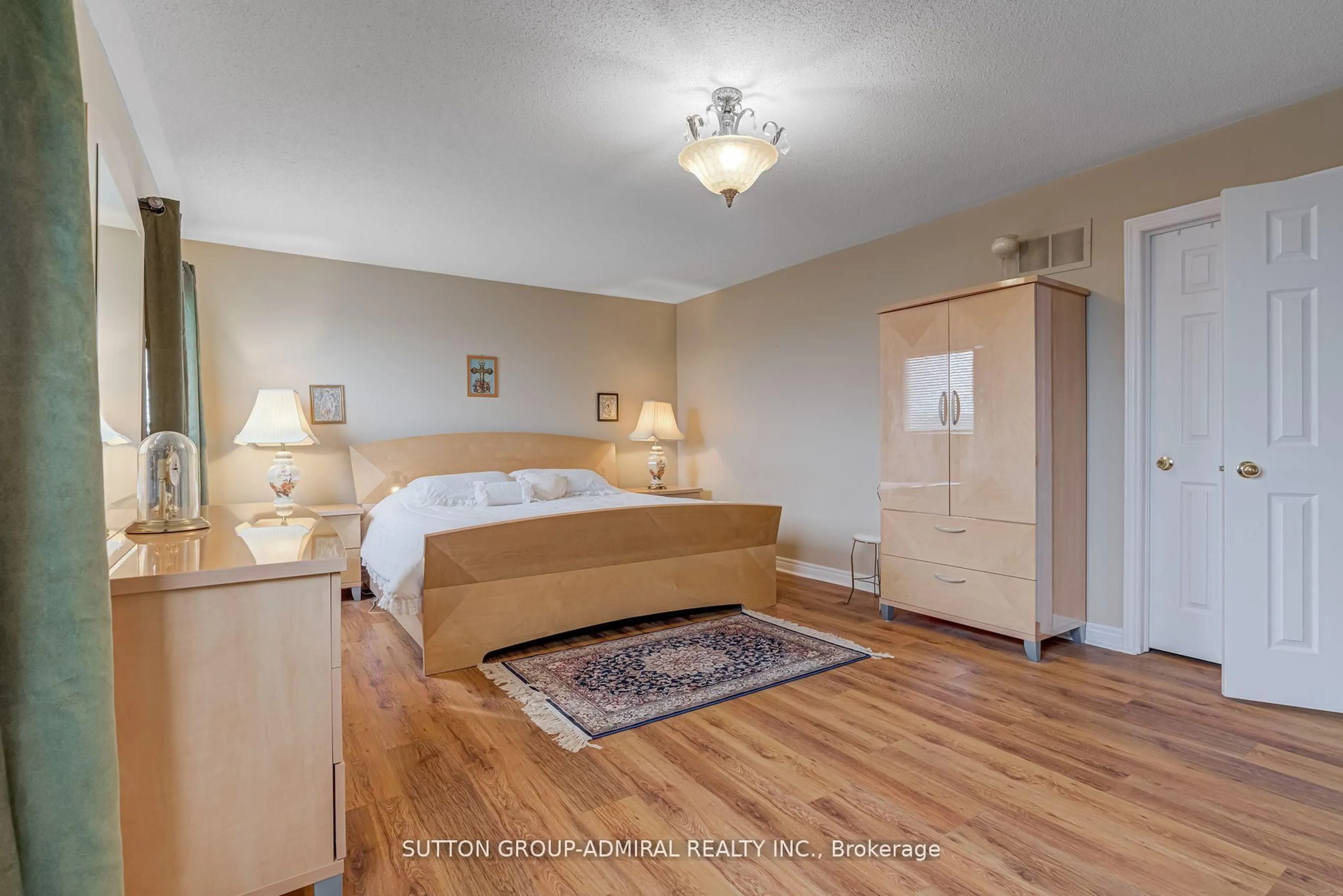 Bedroom with bed, wood/laminate floor for 393 Coachwhip Tr, Newmarket Ontario L3X 2R2