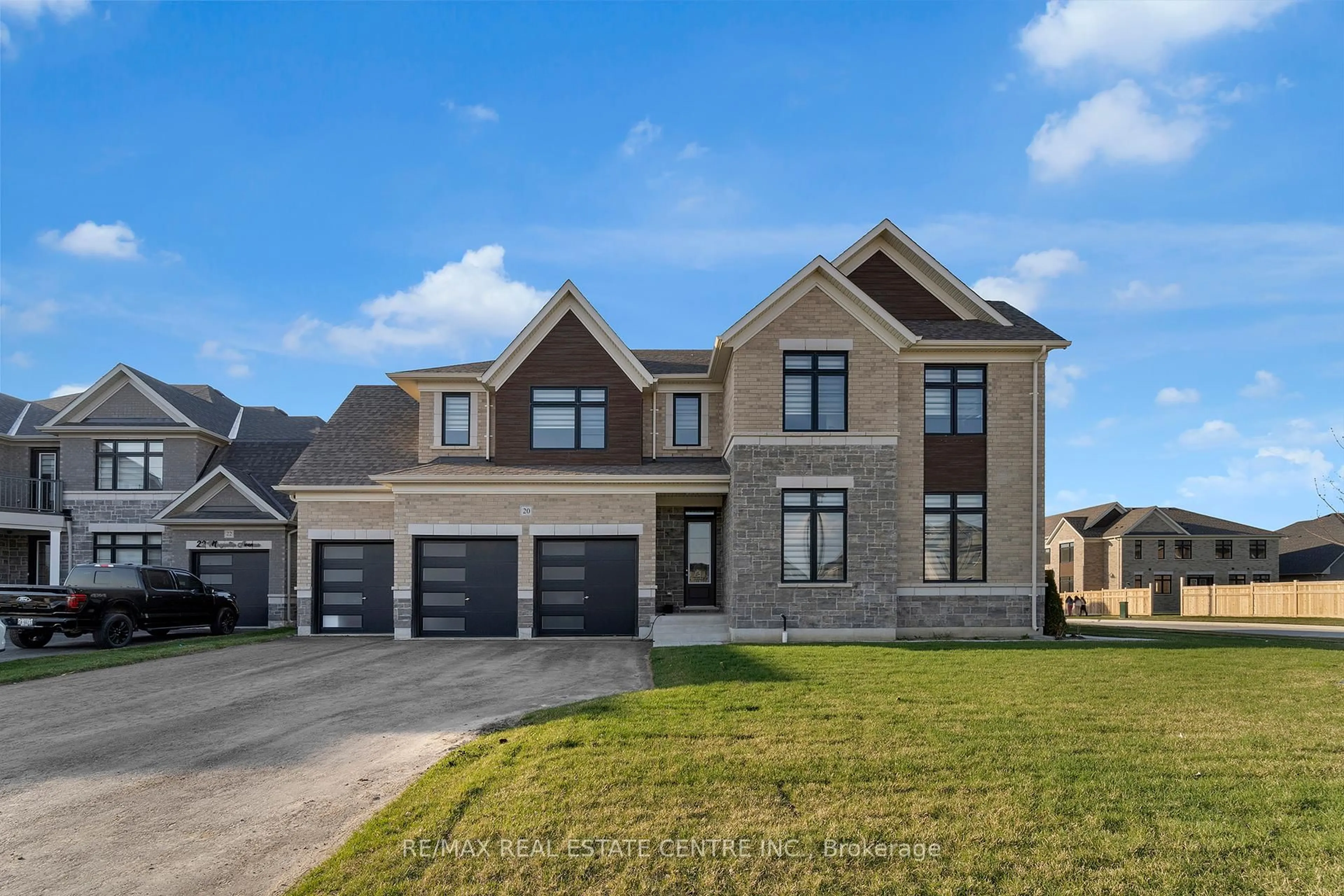 Home with brick exterior material, street for 20 Magnolia Ave, Adjala-Tosorontio Ontario L0G 1W0