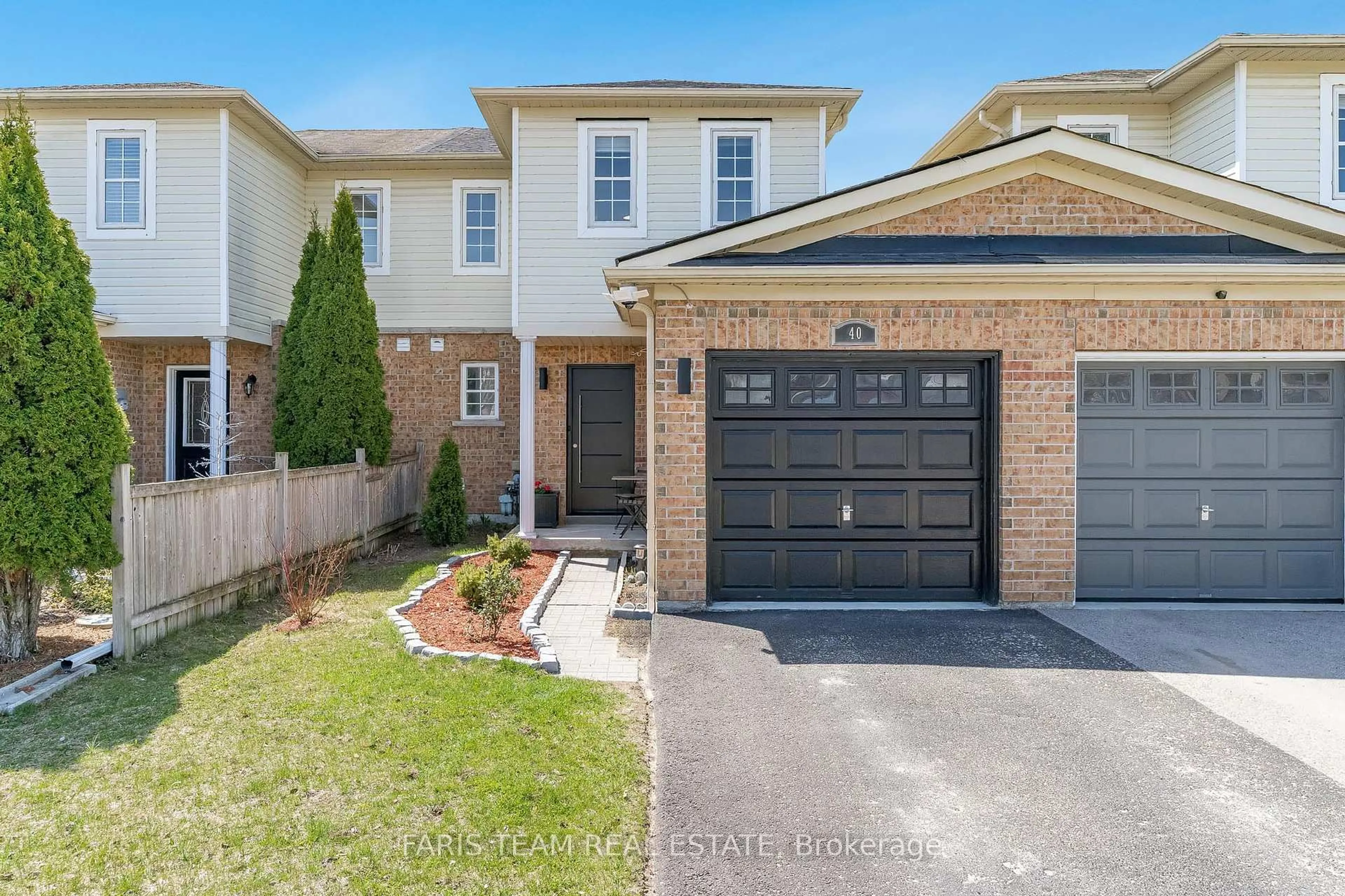 Home with brick exterior material, street for 40 McCann Lane, Essa Ontario L0M 1B4