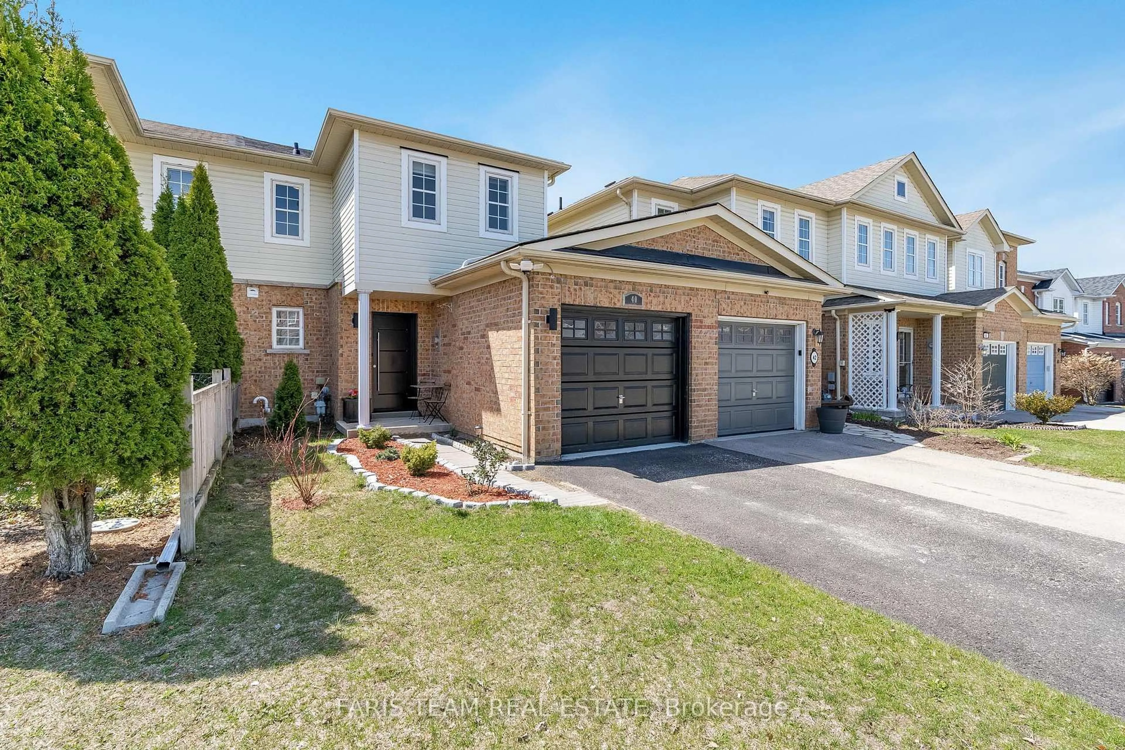 Home with brick exterior material, street for 40 McCann Lane, Essa Ontario L0M 1B4
