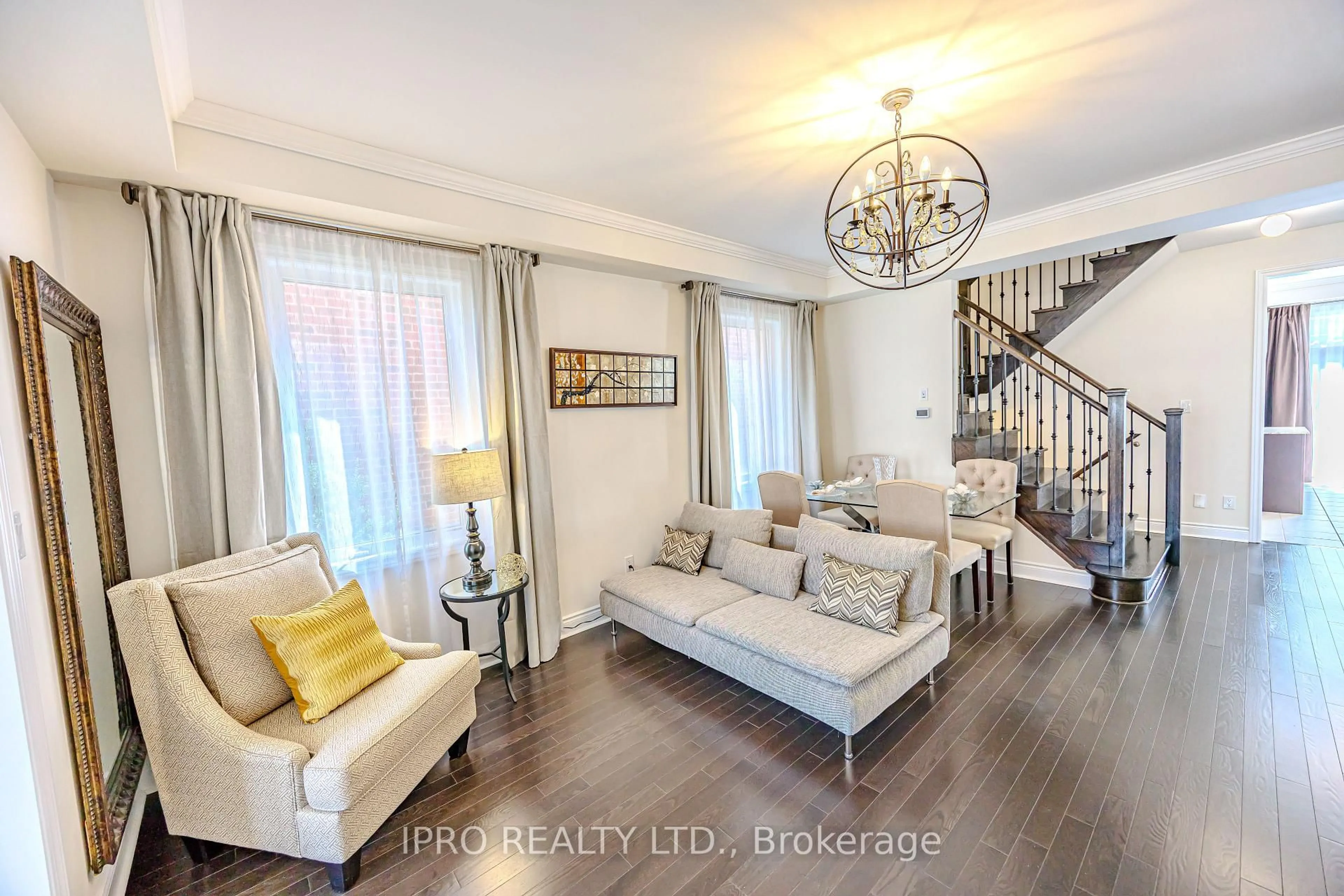 Living room with furniture, wood/laminate floor for 1029 Blackhall Cres, Newmarket Ontario L3X 0B2