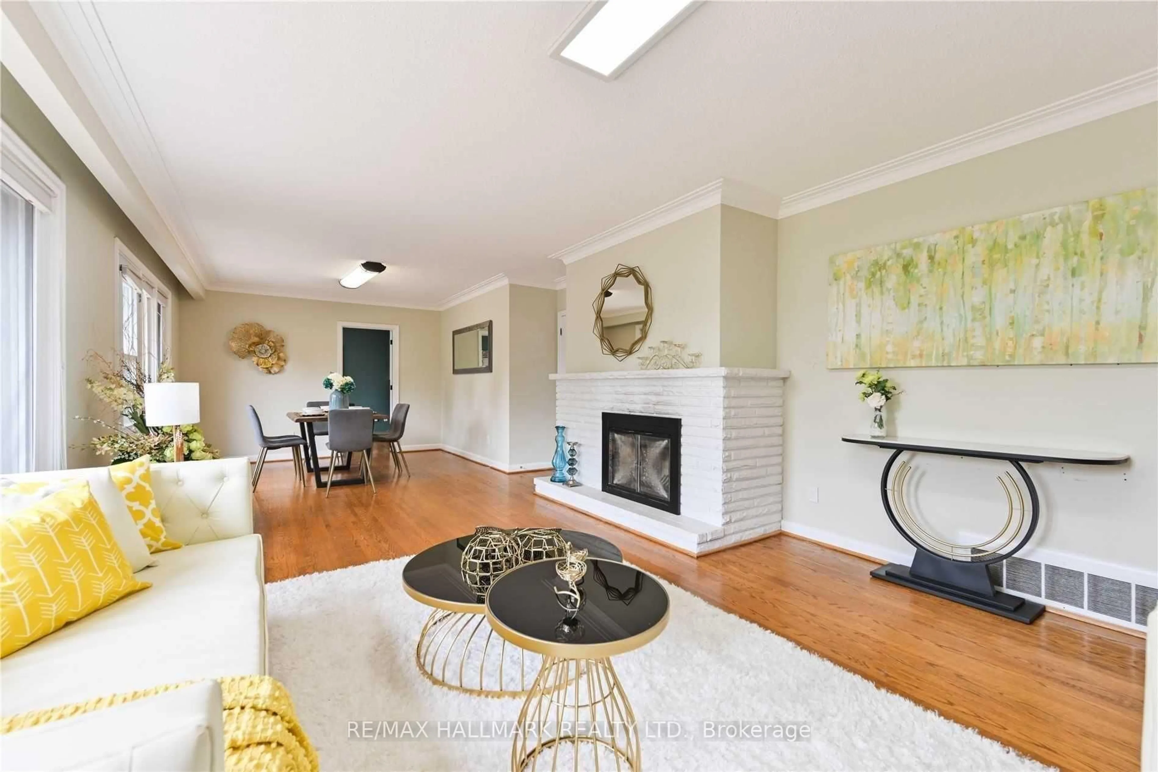 Living room with furniture, wood/laminate floor for 16 Cavalier Cres, Vaughan Ontario L4J 1K5
