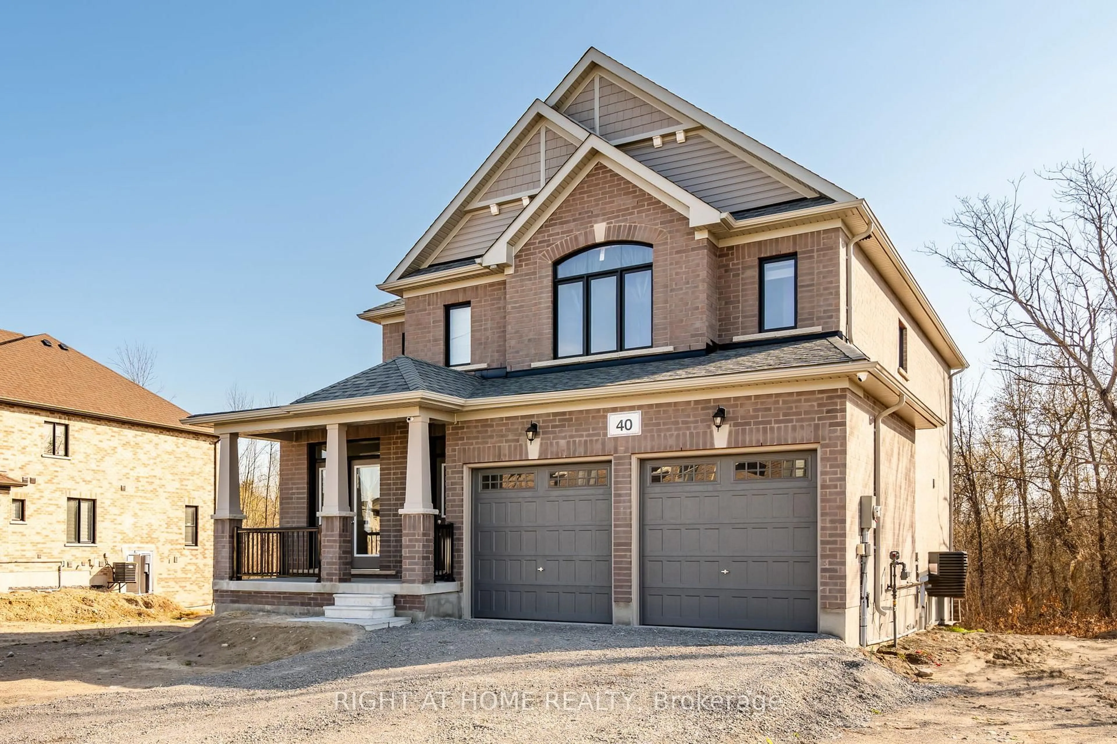 Home with brick exterior material, street for 40 Baycroft Blvd, Essa Ontario L3W 0M1