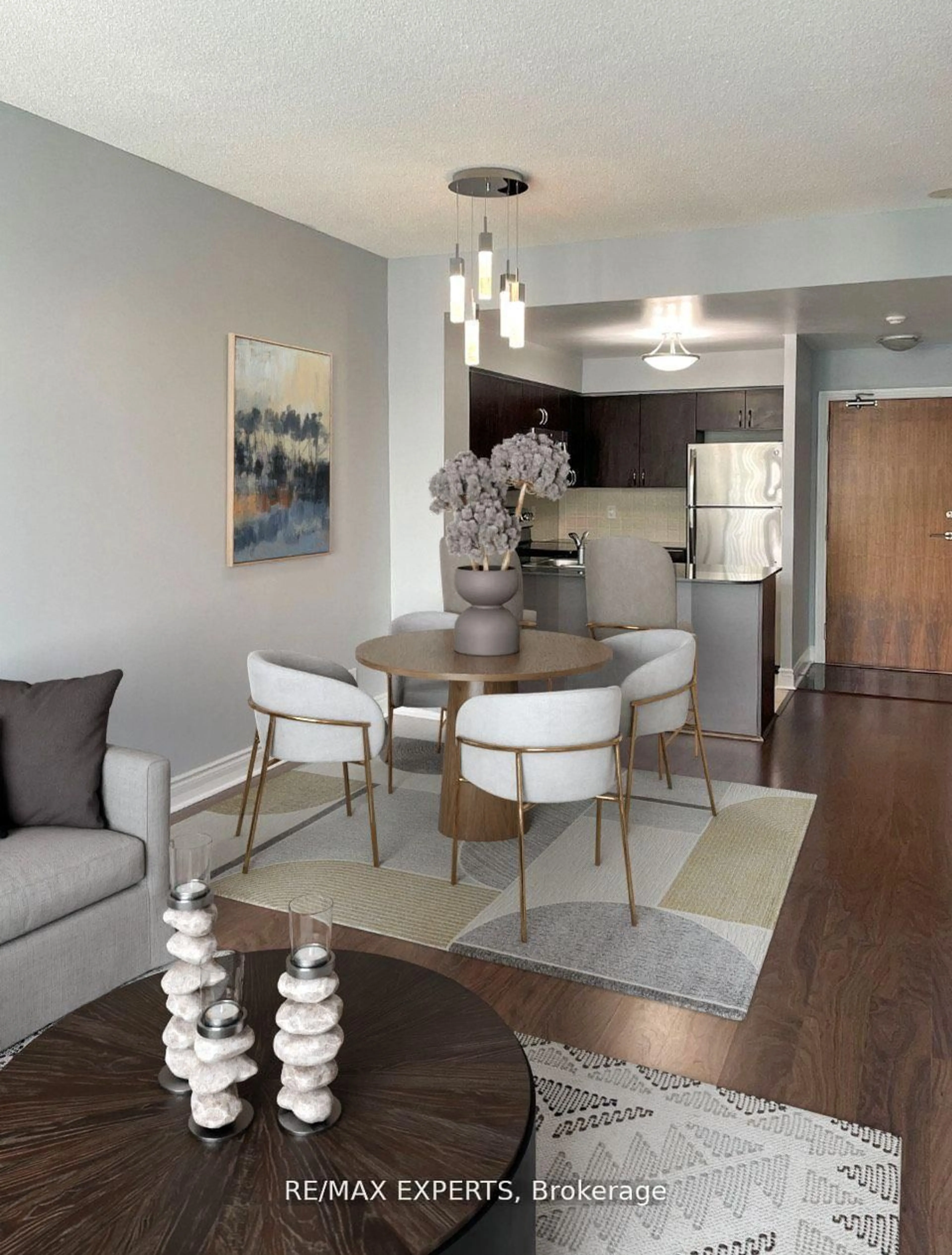 Living room with furniture, wood/laminate floor for 30 Clegg Rd #921, Markham Ontario L6G 0B4