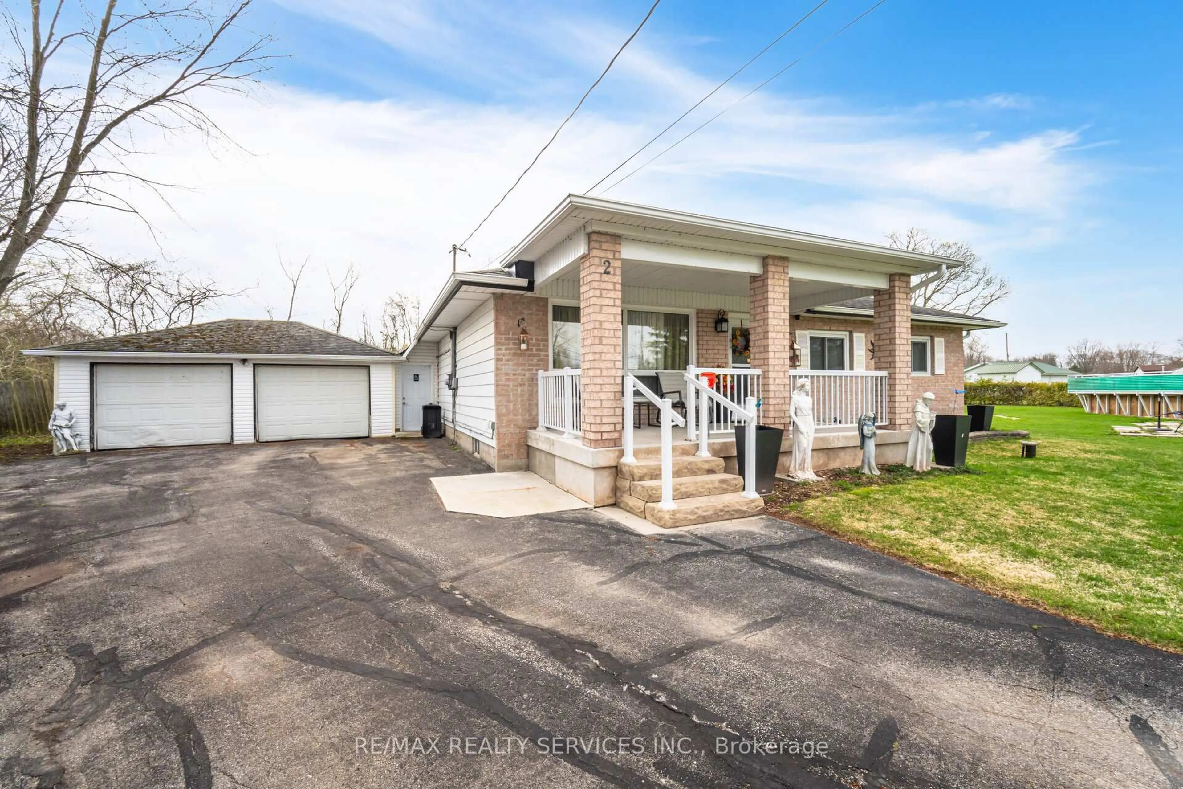Home with brick exterior material, street for 2 Isle Vista Dr, Georgina Ontario L0E 1N0