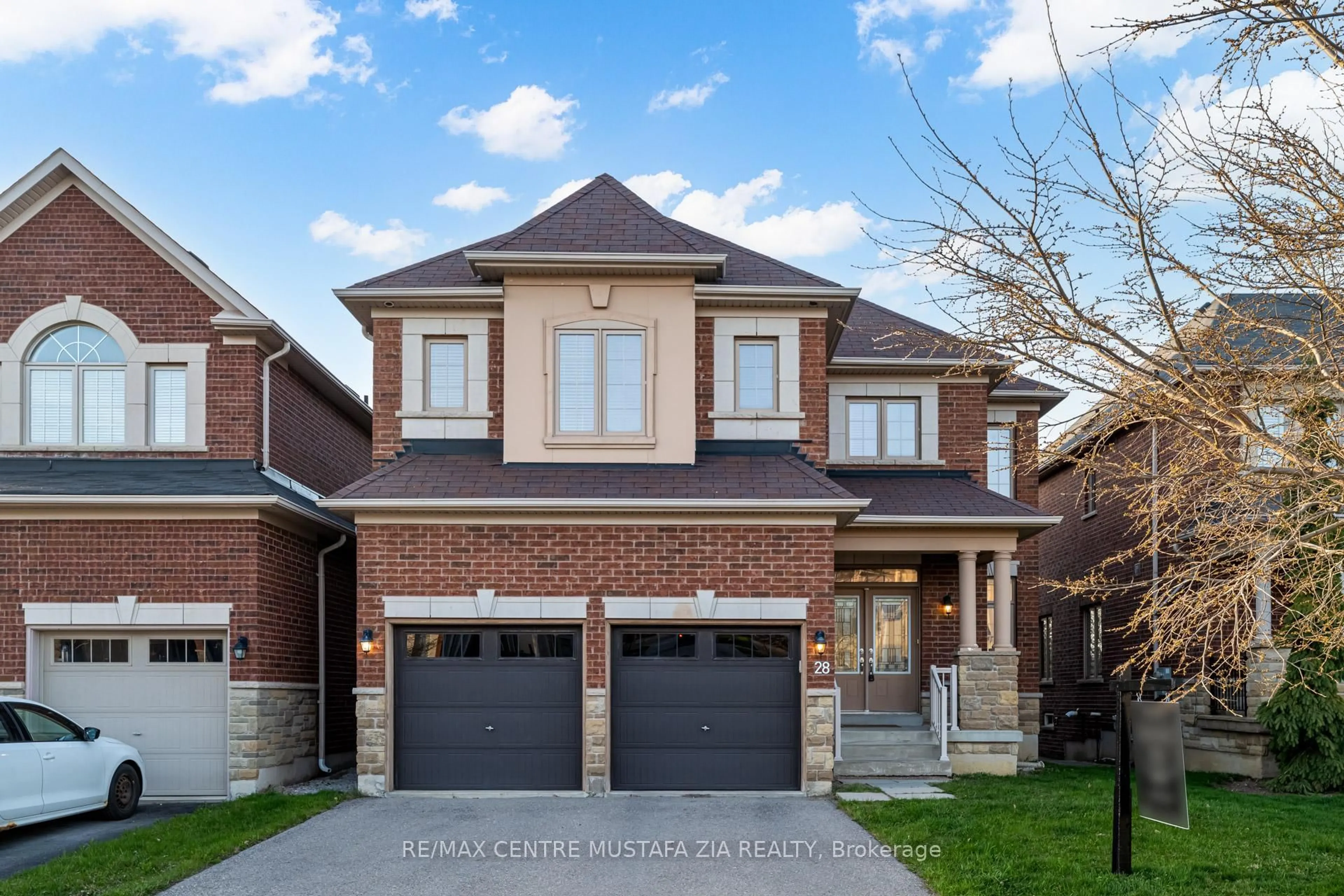 Home with brick exterior material, street for 28 Rossini Dr, Richmond Hill Ontario L4E 0R5