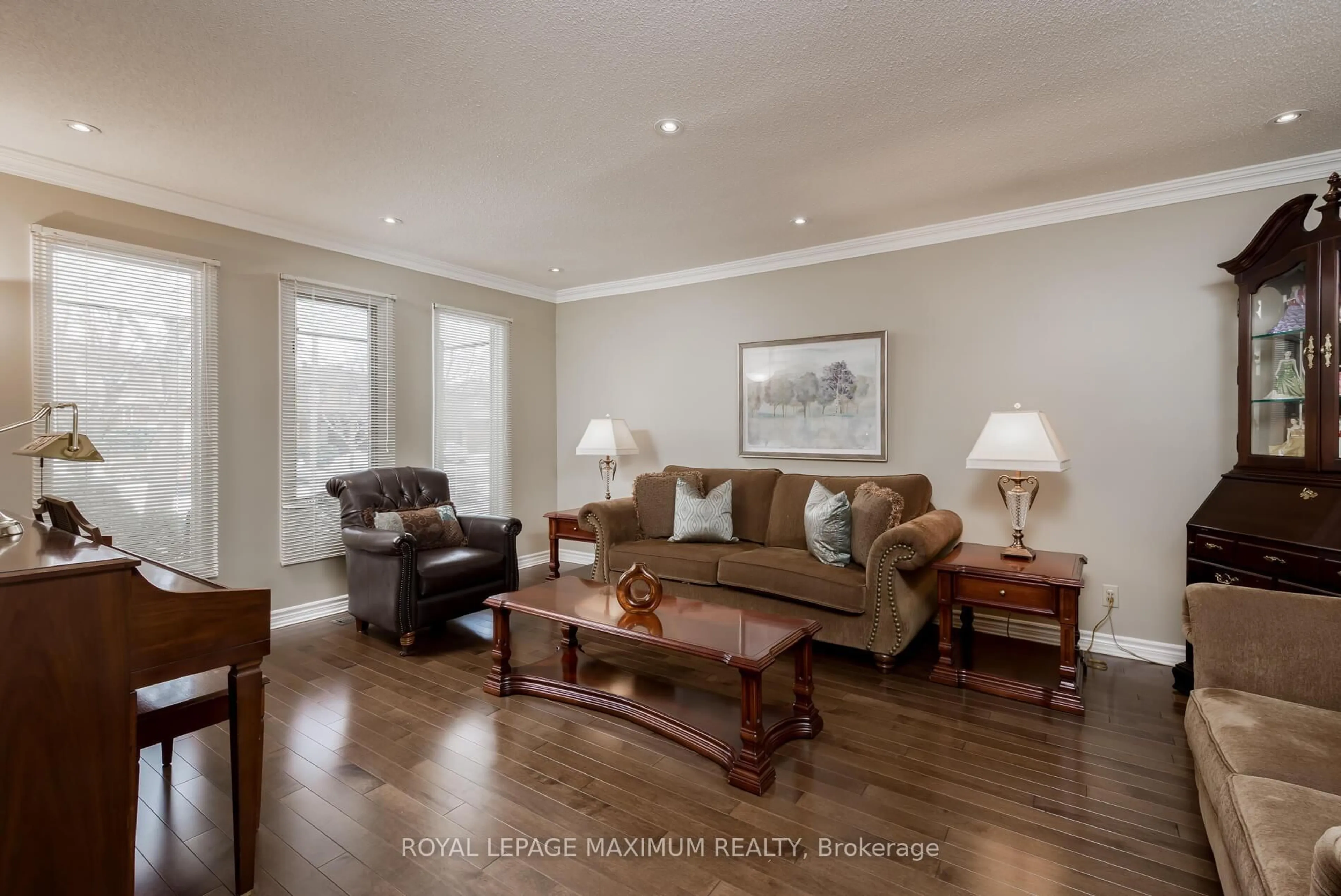 Living room with furniture, wood/laminate floor for 252 Triton Ave, Vaughan Ontario L4L 6R1