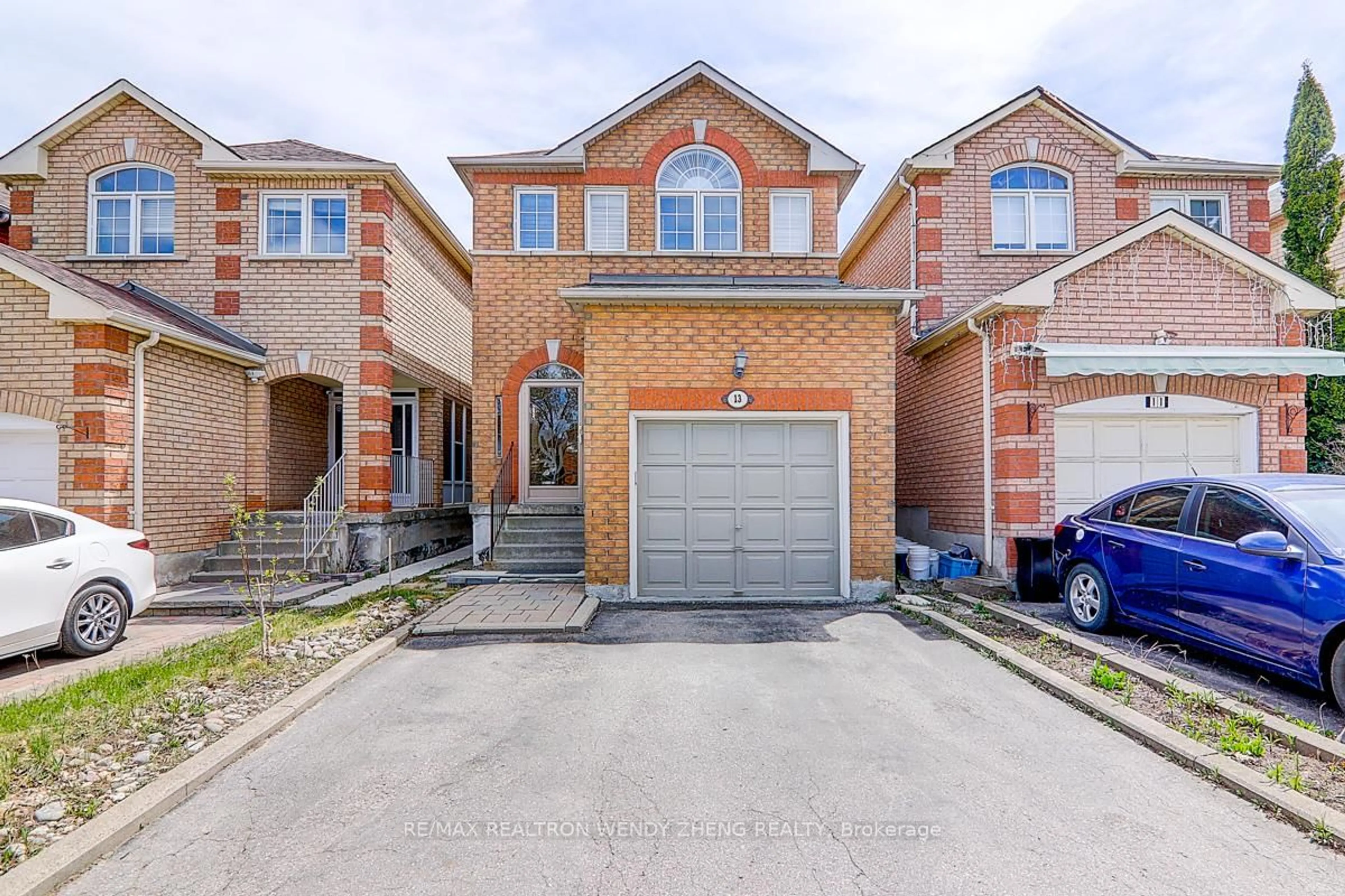 Home with brick exterior material, street for 13 Apollo Rd, Markham Ontario L3S 4G8