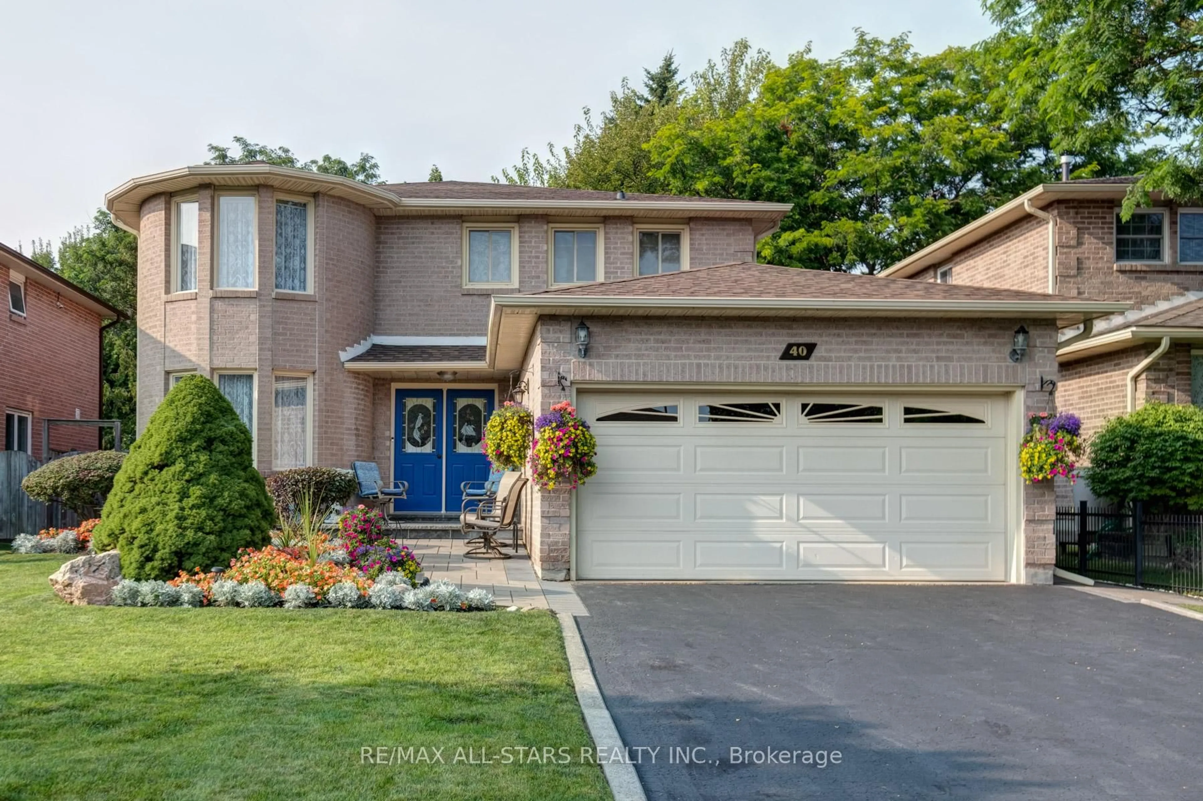 Home with brick exterior material, street for 40 Eastwood Cres, Markham Ontario L3P 5Z7