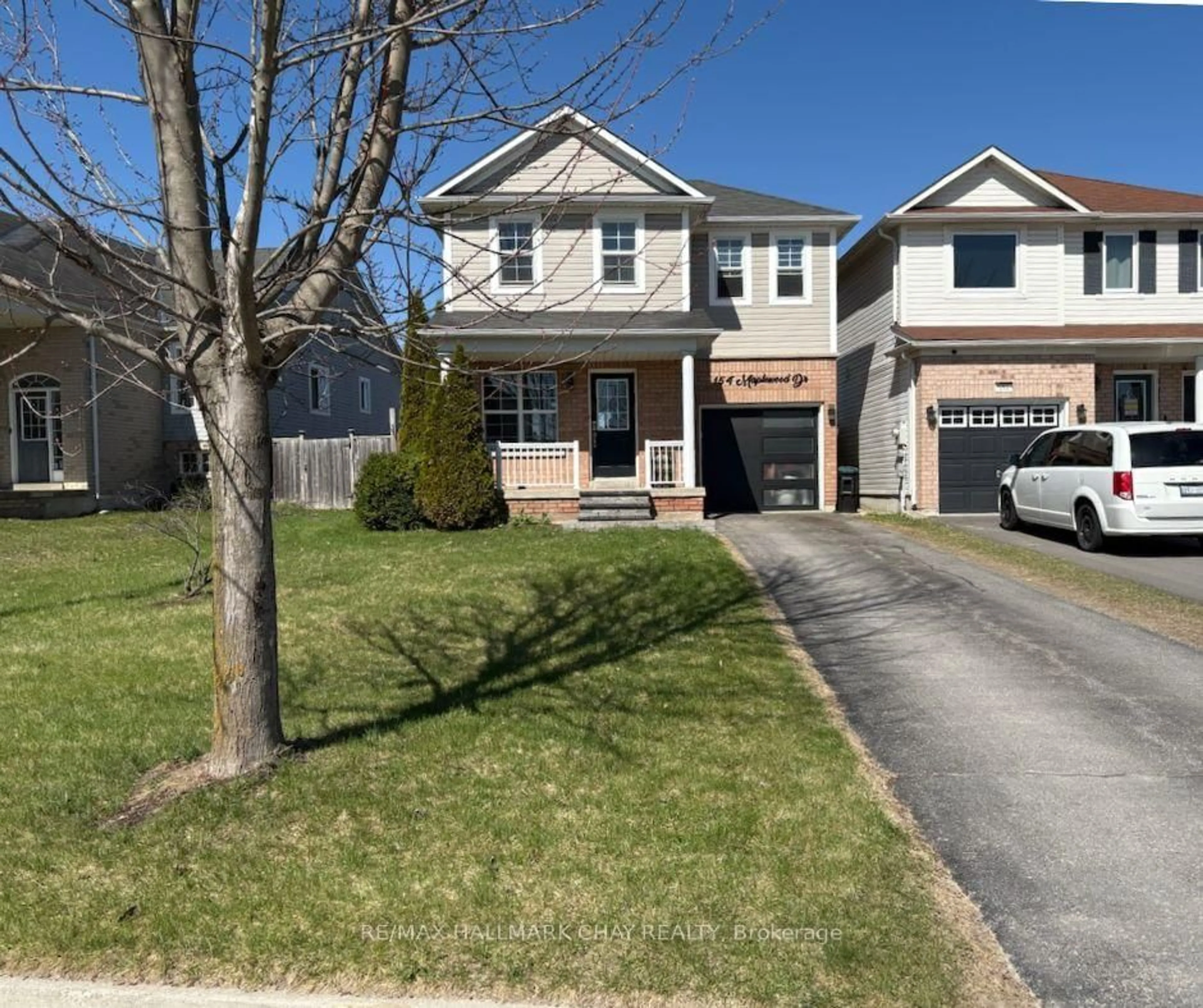 Home with vinyl exterior material, street for 154 Maplewood Dr, Essa Ontario L0M 1B4