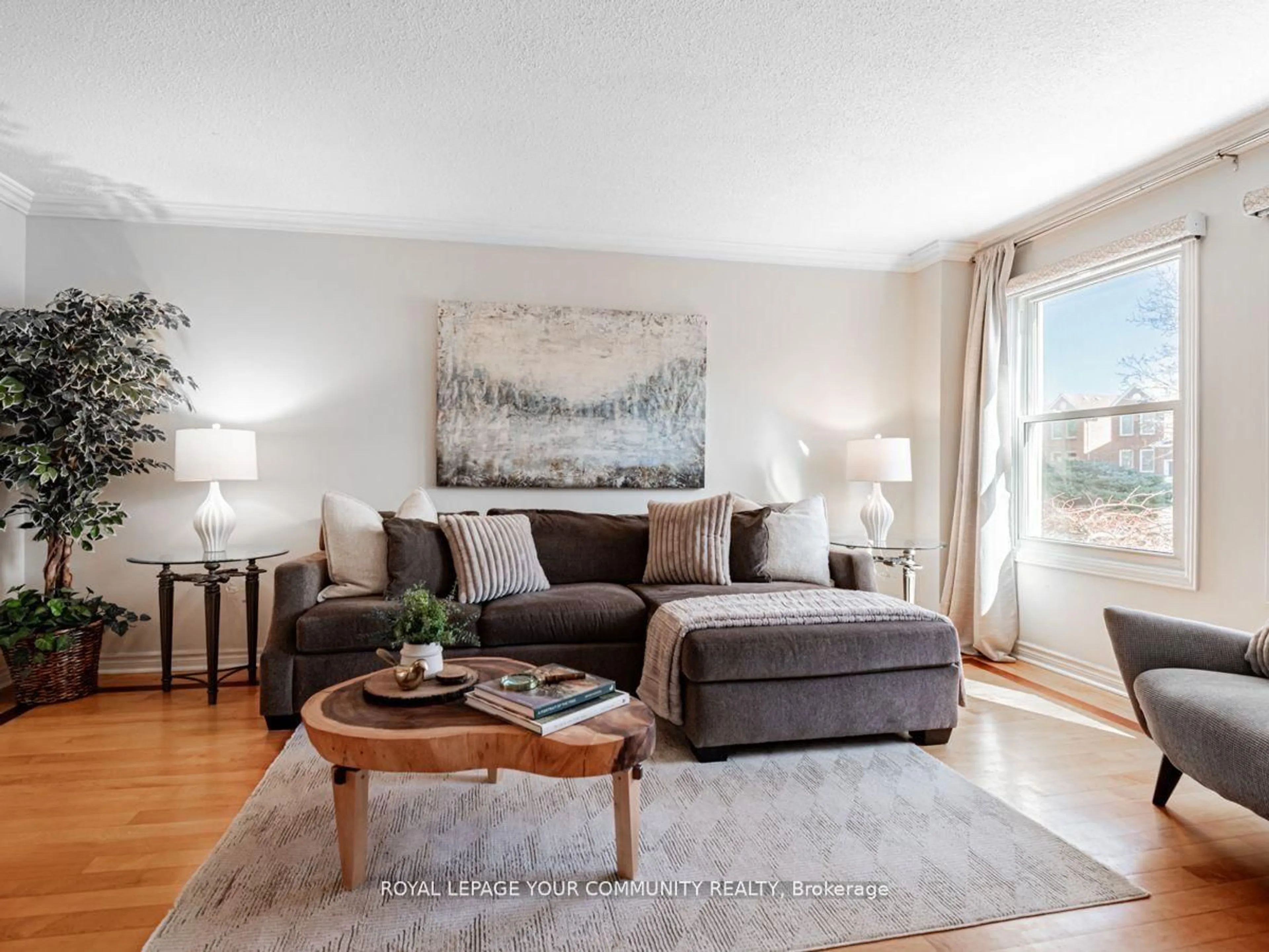 Living room with furniture, wood/laminate floor for 46 Garnish Green N/A, Markham Ontario L3P 4P5