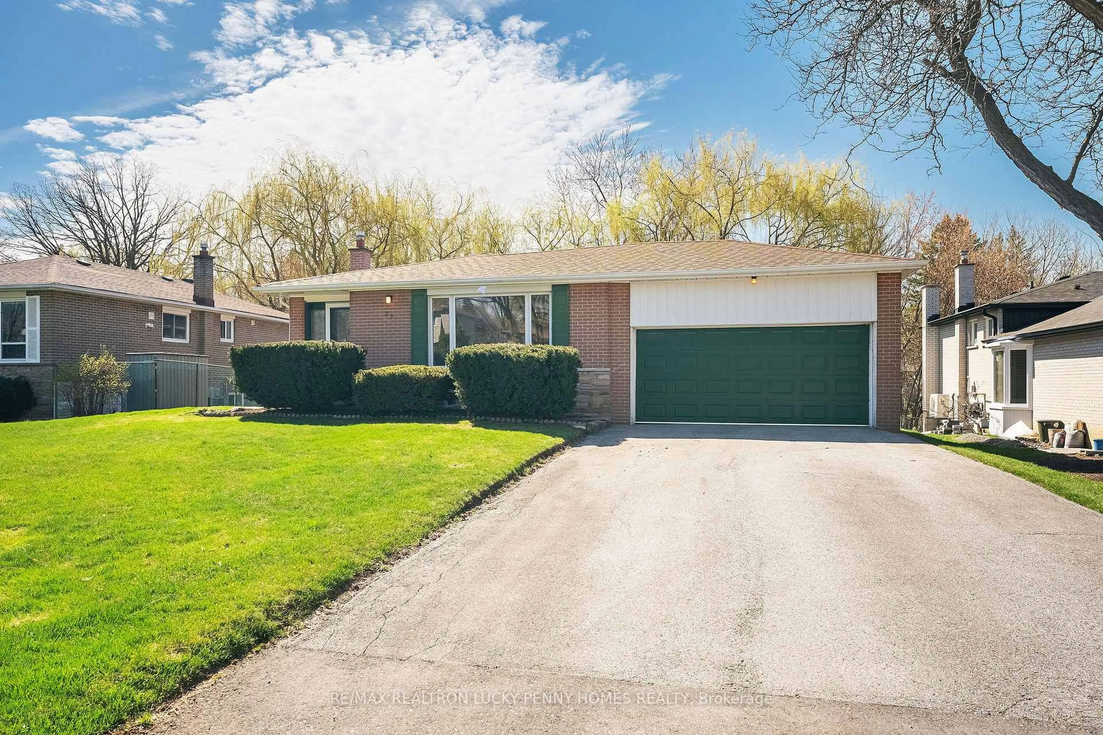 Home with brick exterior material, street for 23 Bakerdale Rd, Markham Ontario L3P 1J3