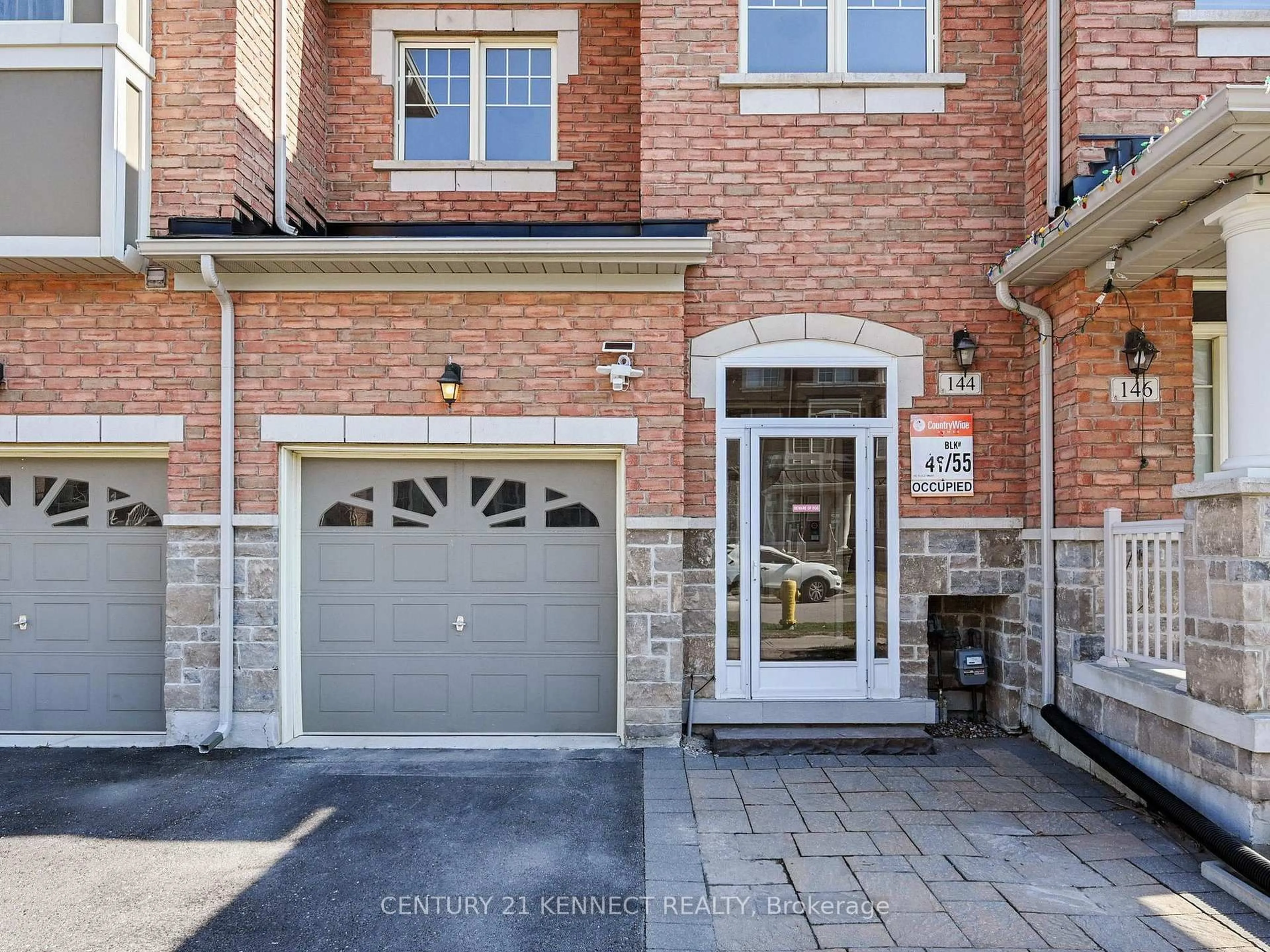 Home with brick exterior material, street for 144 Memon Pl, Markham Ontario L6E 0R9