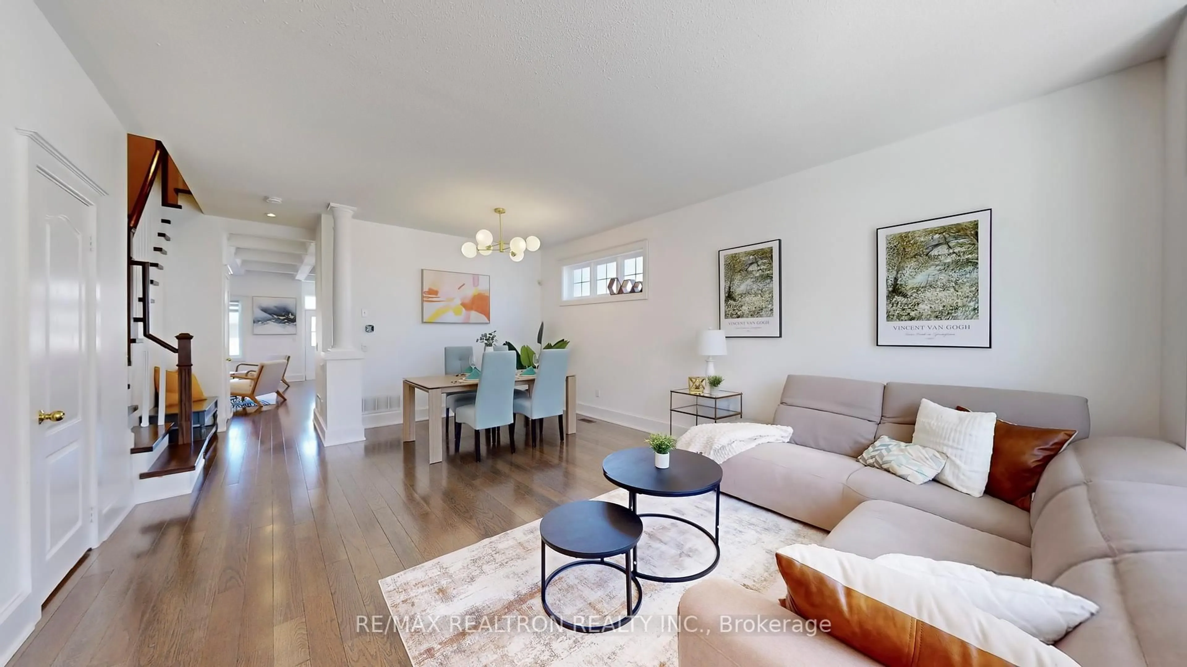 Living room with furniture, wood/laminate floor for 78 Prospector's Dr, Markham Ontario L6C 1Z1