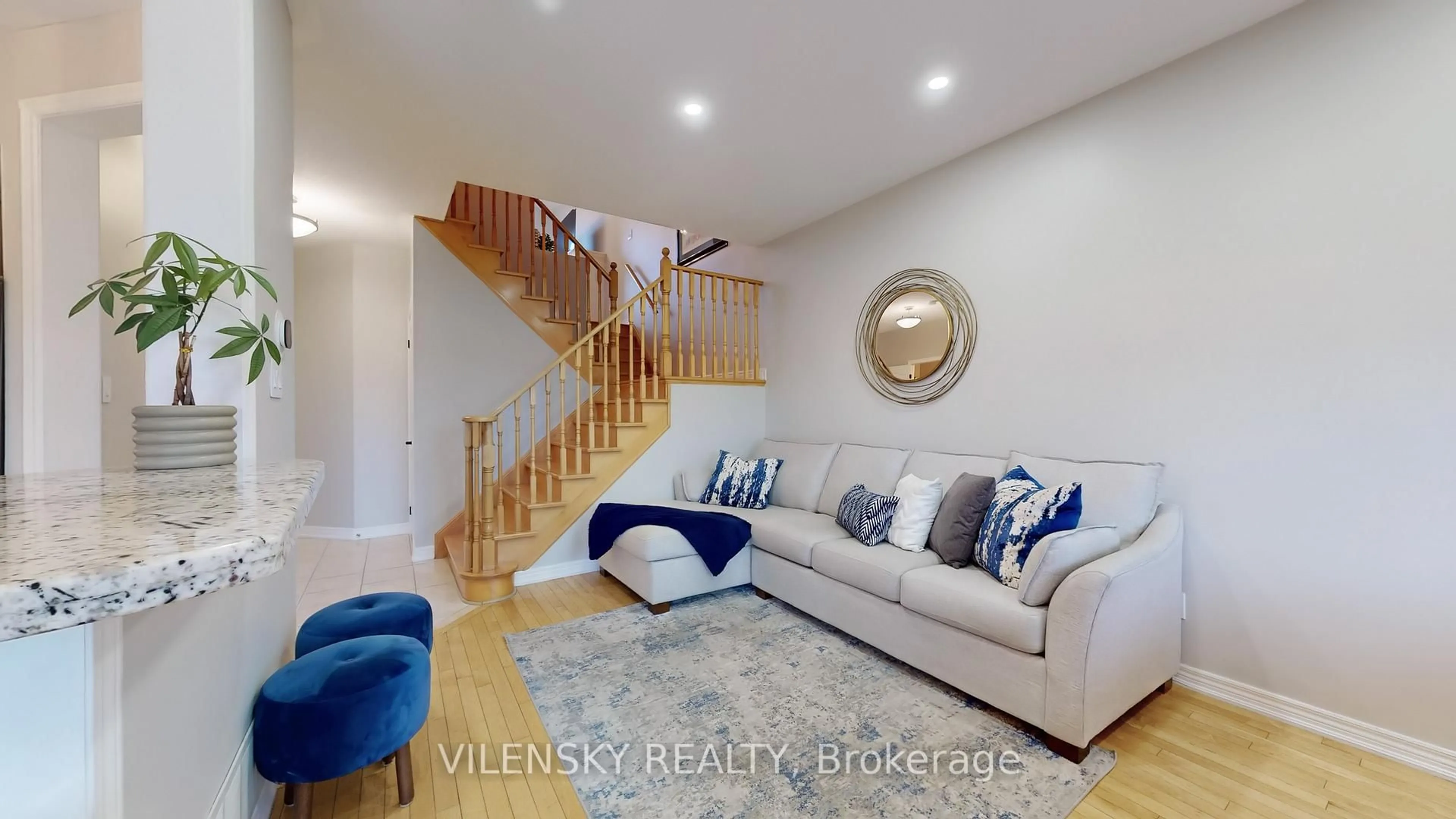 Living room with furniture, wood/laminate floor for 65 Bentwood Cres, Vaughan Ontario L4J 8R3