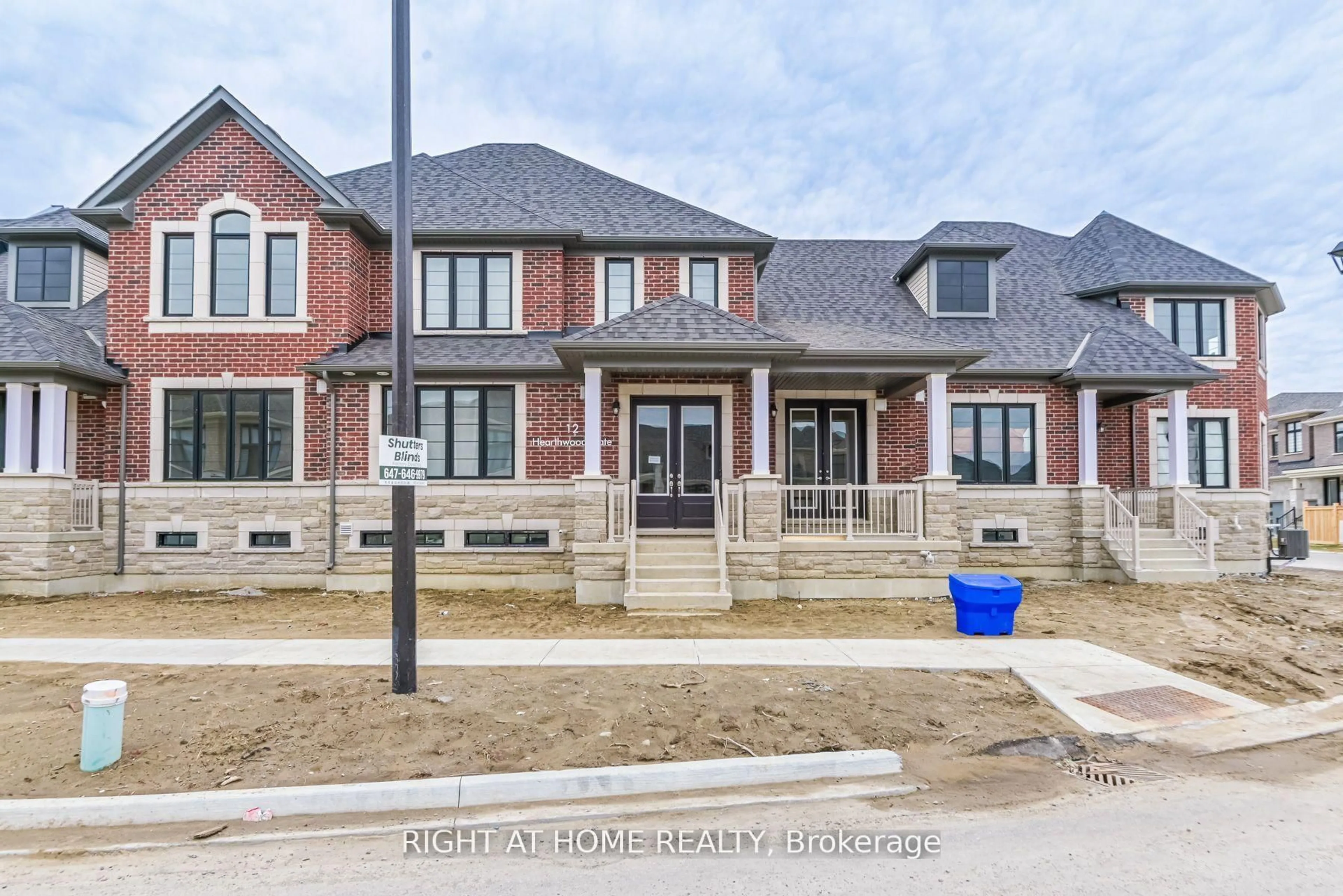Home with brick exterior material, street for 12 Hearthwood Gate, Whitchurch-Stouffville Ontario L4A 4X1