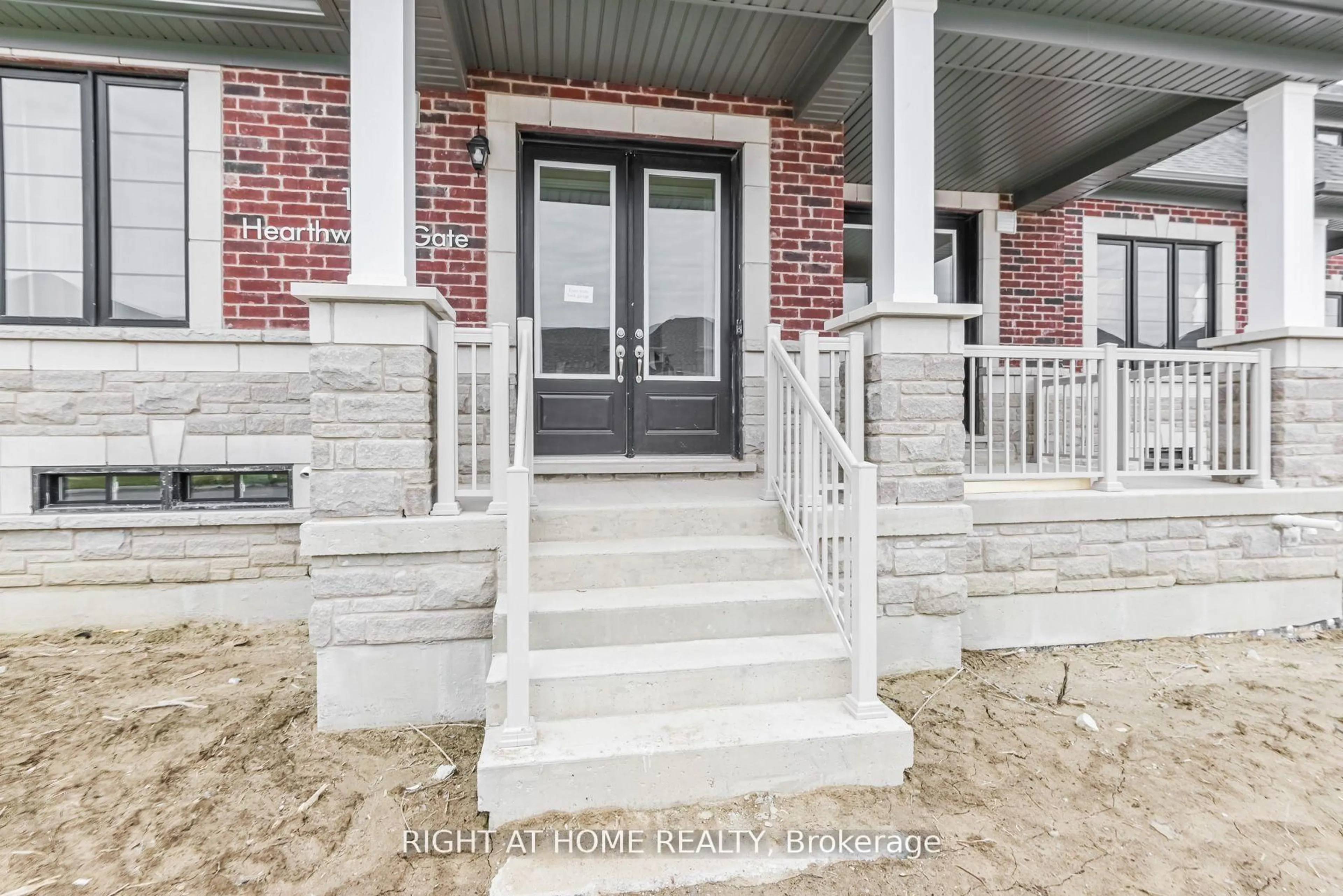 Home with brick exterior material, street for 12 Hearthwood Gate, Whitchurch-Stouffville Ontario L4A 4X1