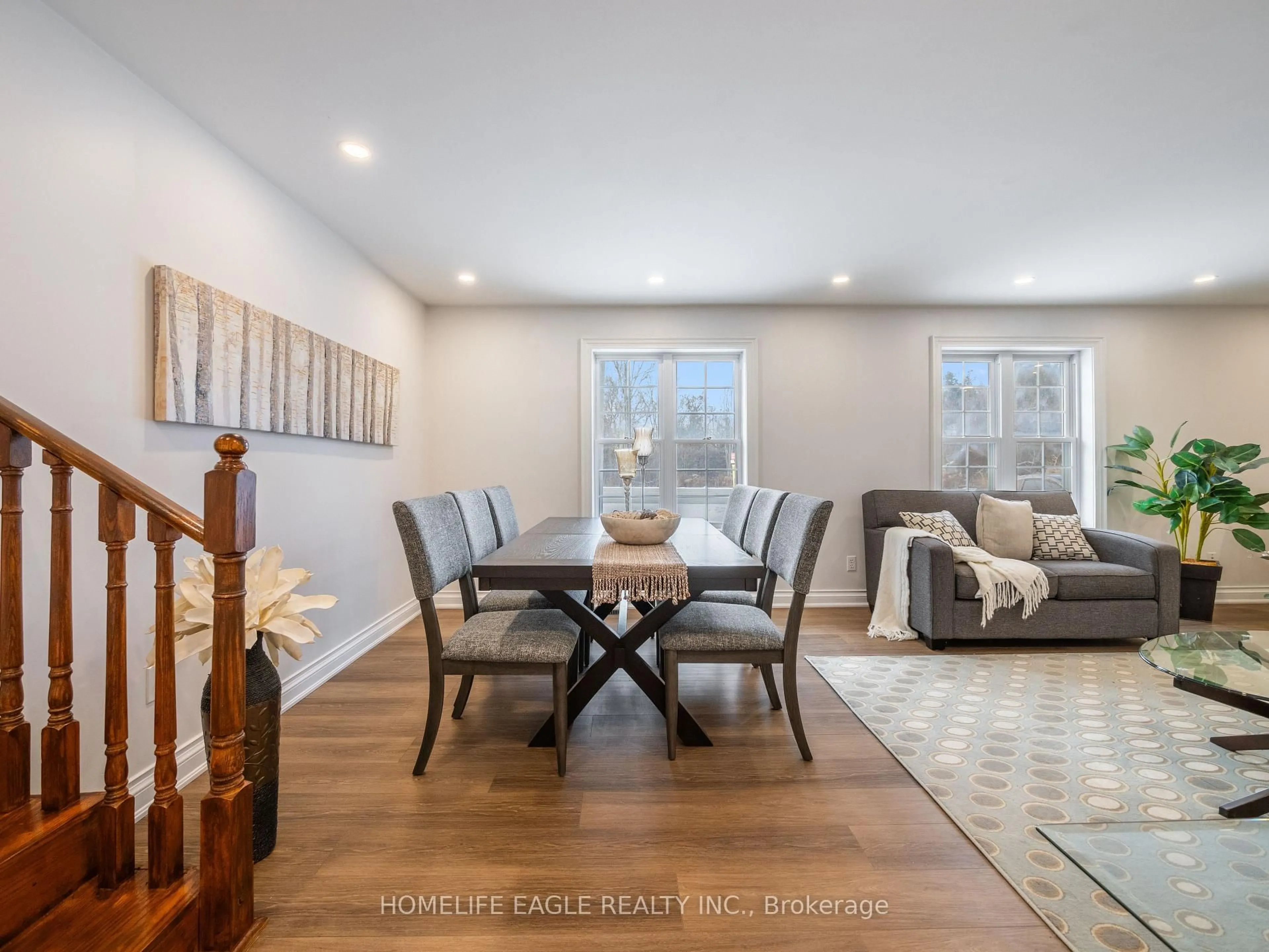 Living room with furniture, wood/laminate floor for 4566 Lloydtown-Aurora Rd, King Ontario L7B 0E3