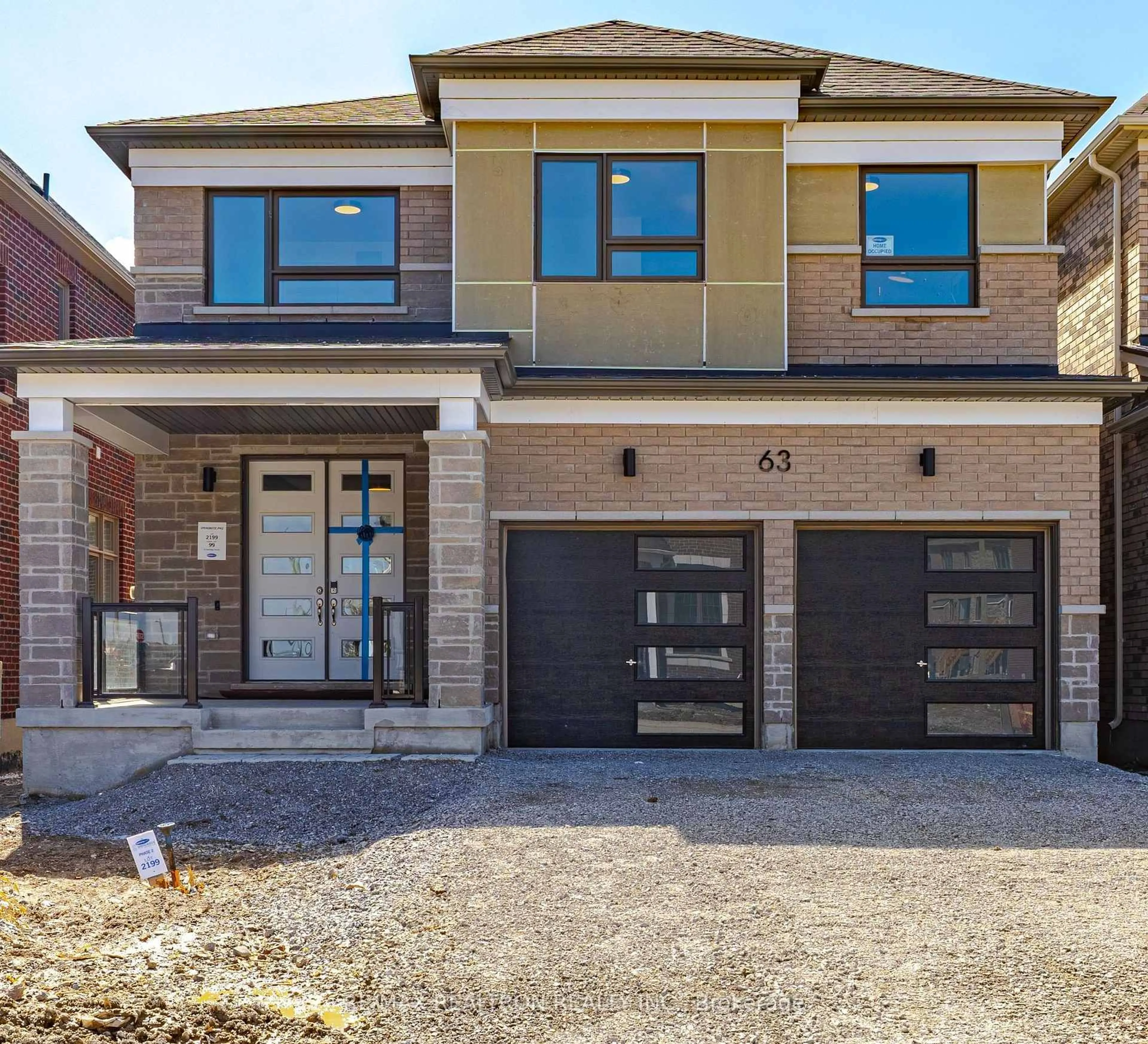 Home with brick exterior material, street for 63 Greenridge Cres, Markham Ontario L6C 3M1