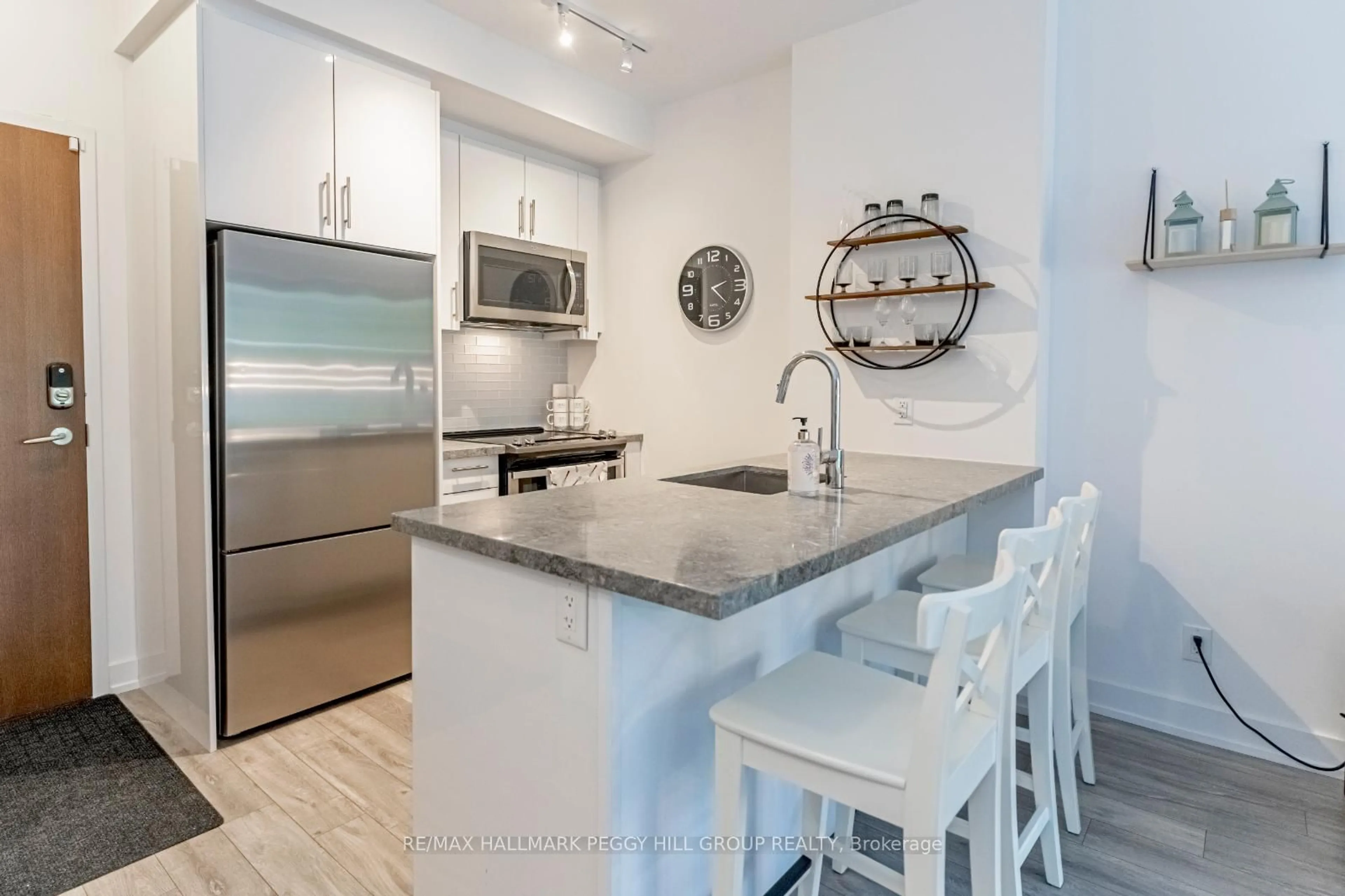 Open concept kitchen, ceramic/tile floor for 333 Sea Ray Ave #131, Innisfil Ontario L9S 0M3