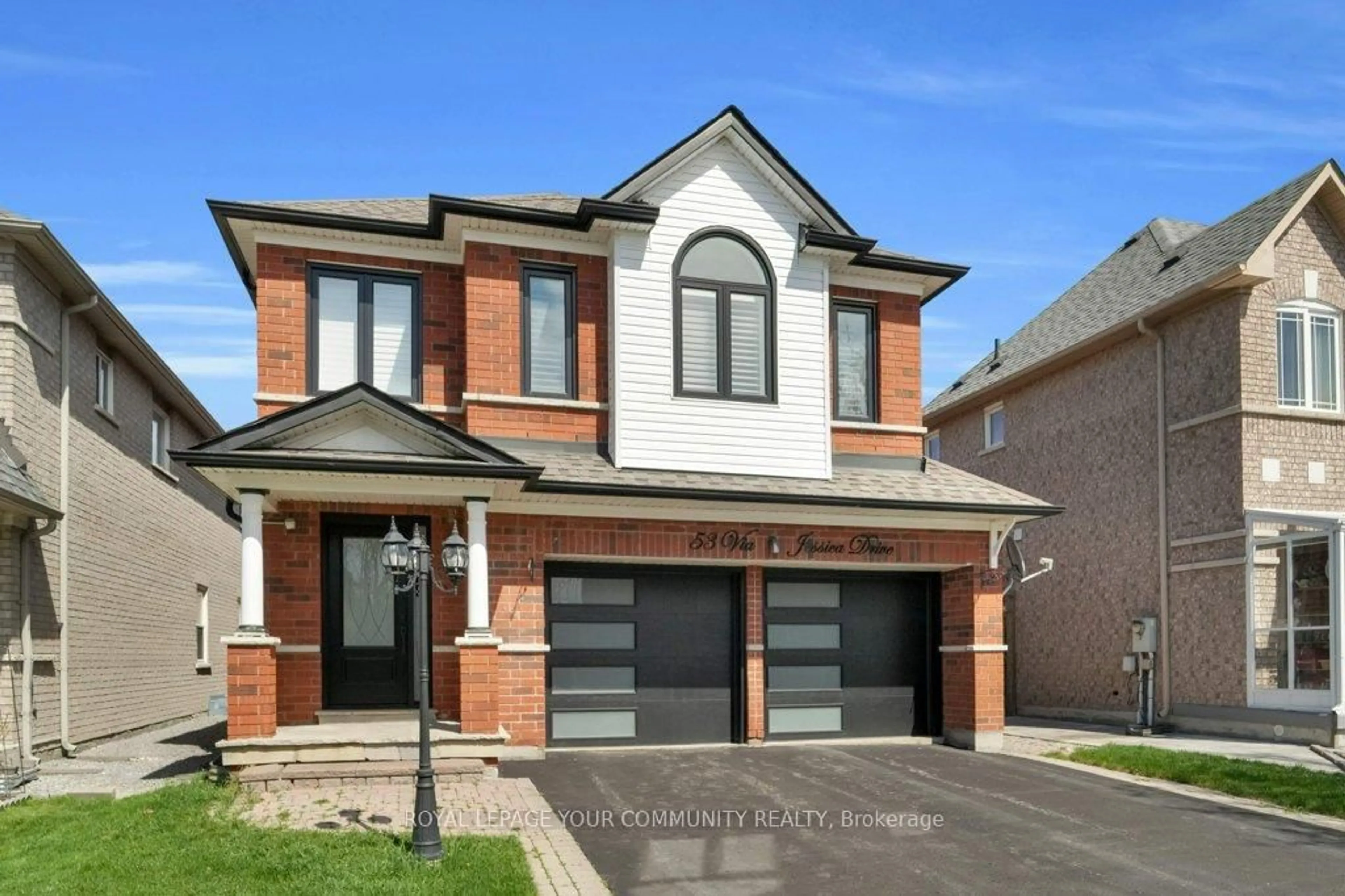 Home with brick exterior material, street for 53 Via Jessica Dr, Markham Ontario L3R 4W7