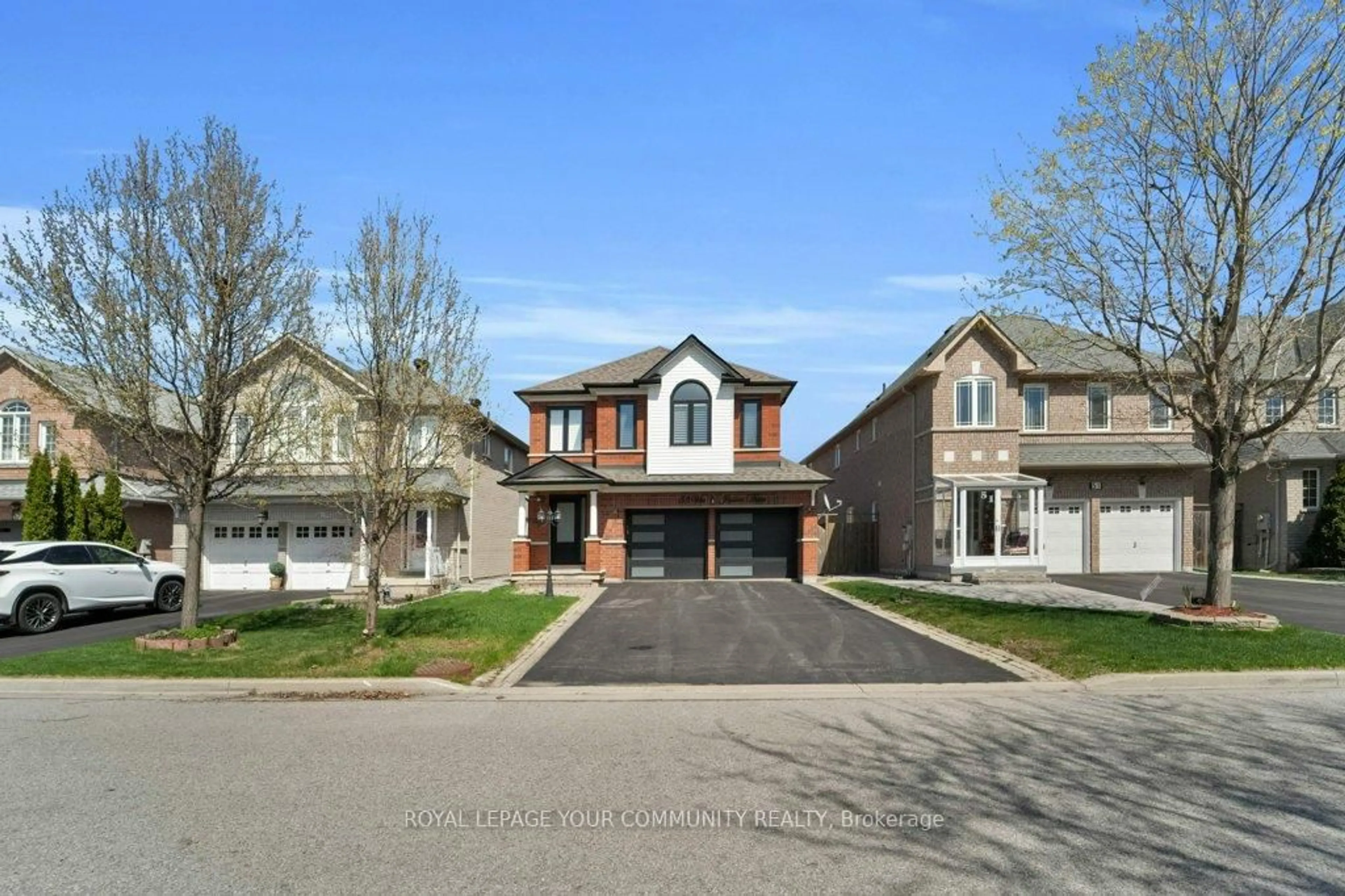 Home with brick exterior material, street for 53 Via Jessica Dr, Markham Ontario L3R 4W7