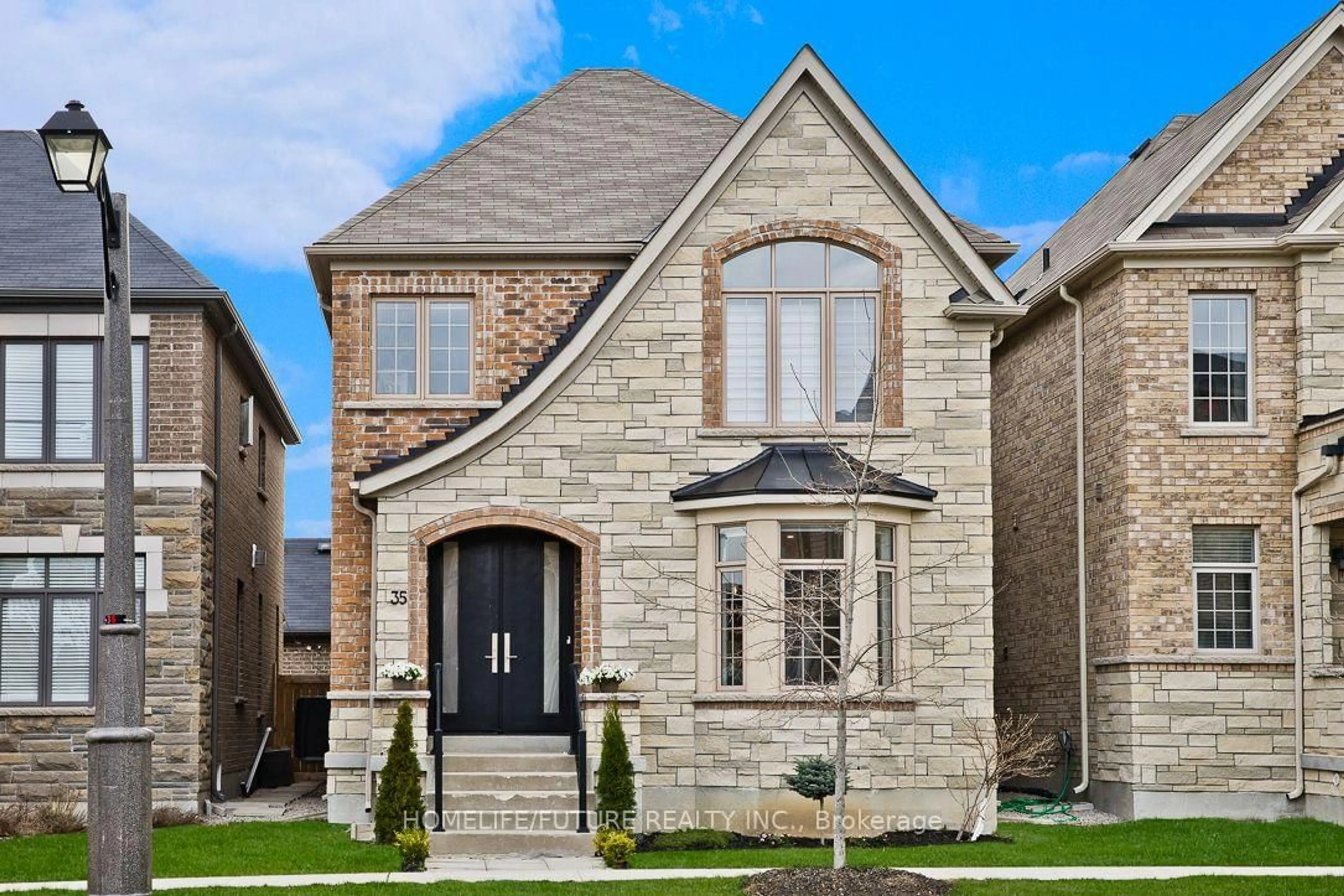 Home with brick exterior material, street for 35 Gordon Landon Dr, Markham Ontario L6B 0X9