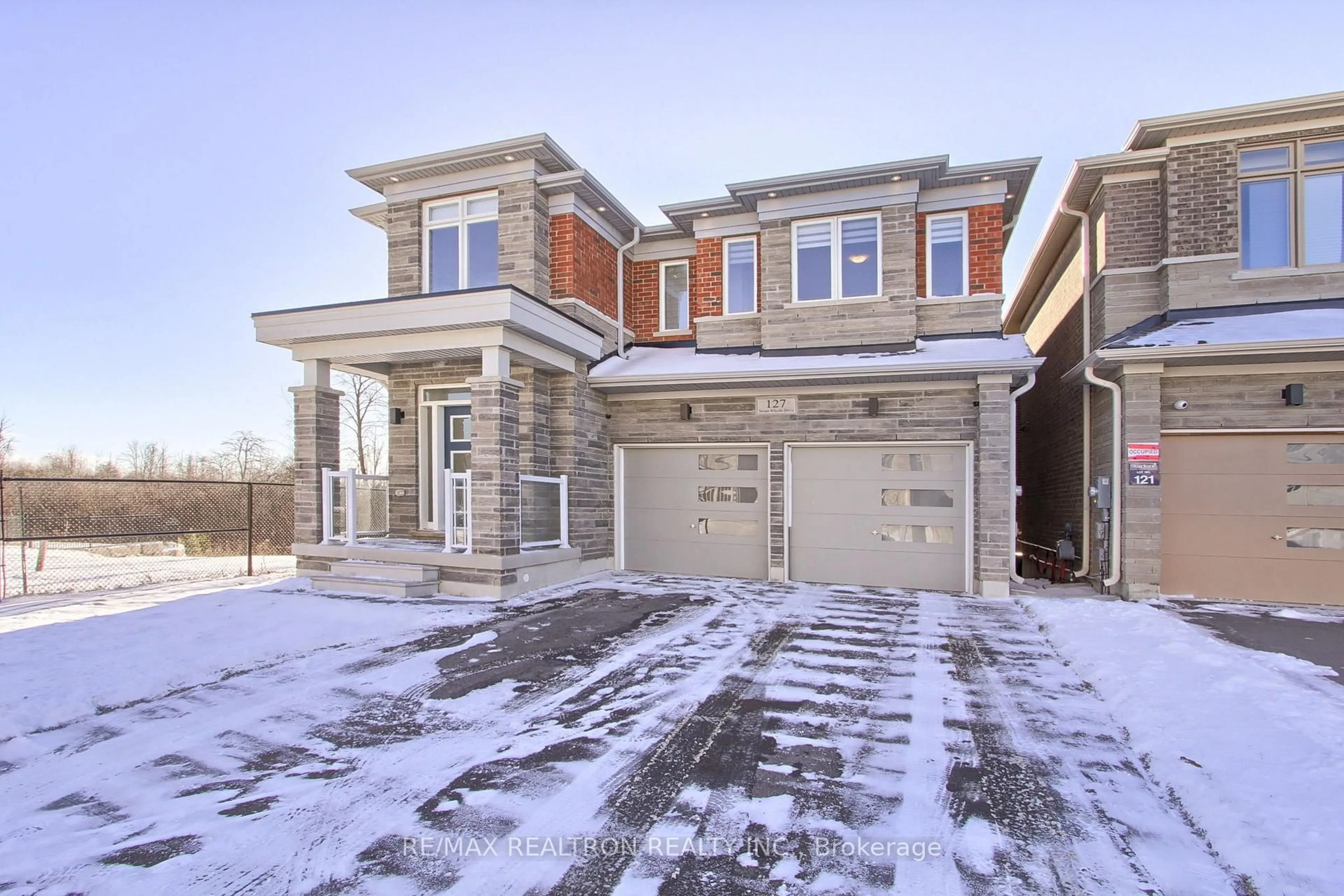 Home with brick exterior material, street for 127 Steam Whistle Dr, Whitchurch-Stouffville Ontario L4A 4X5