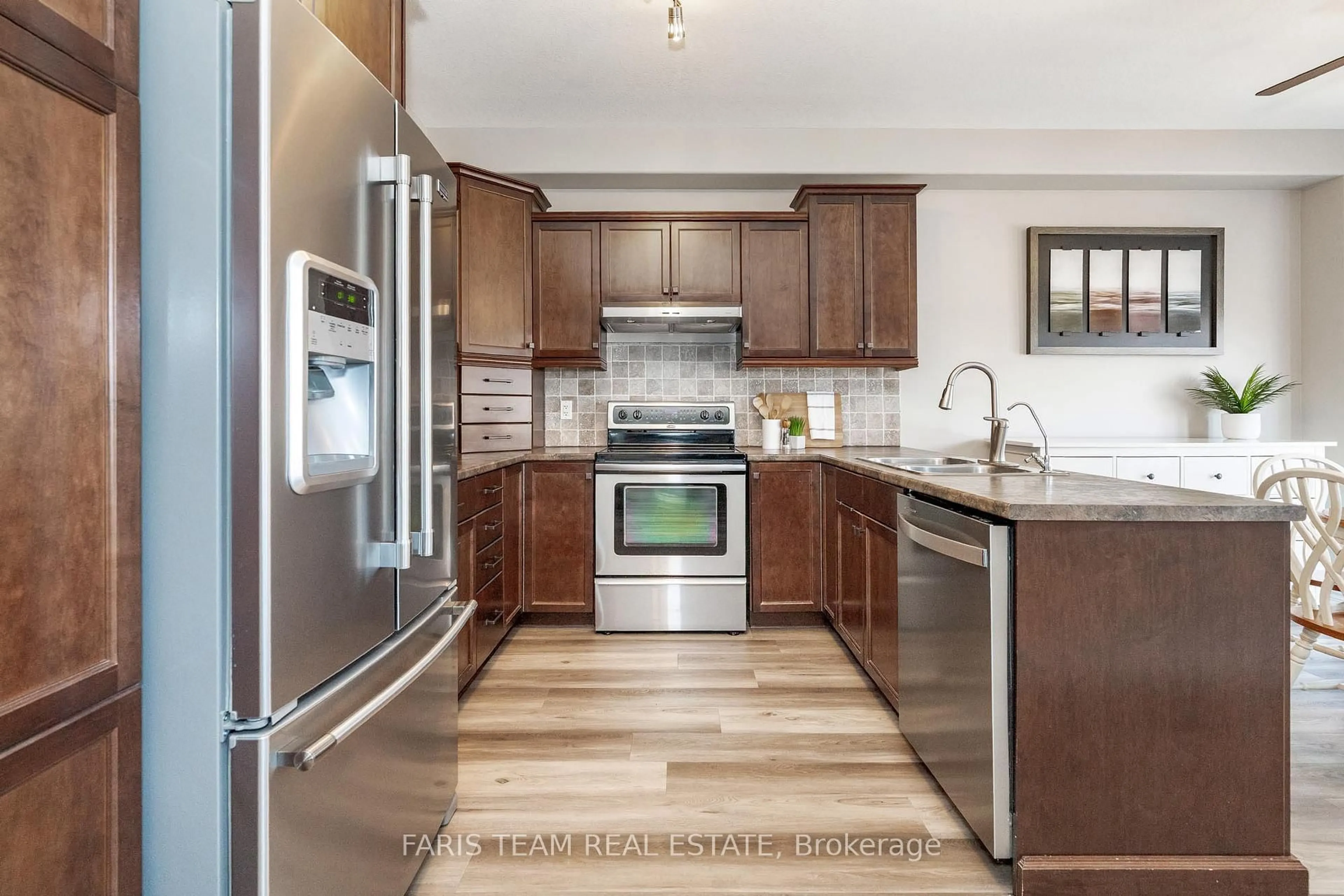 Open concept kitchen, unknown for 106 Mike Hart Dr, Essa Ontario L3W 0P7