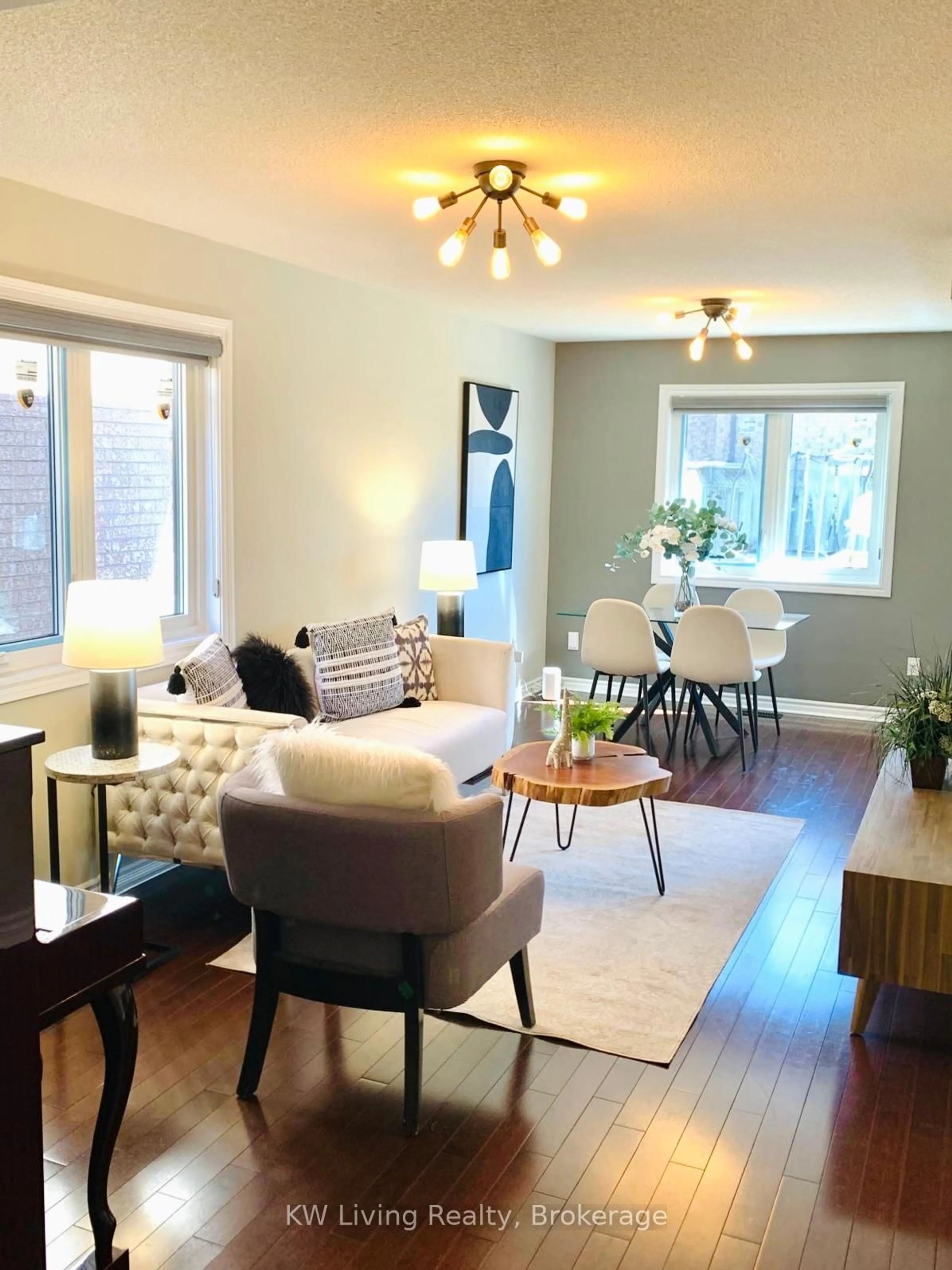 Living room with furniture, wood/laminate floor for 85 Woodhaven Cres, Richmond Hill Ontario L4E 3T3