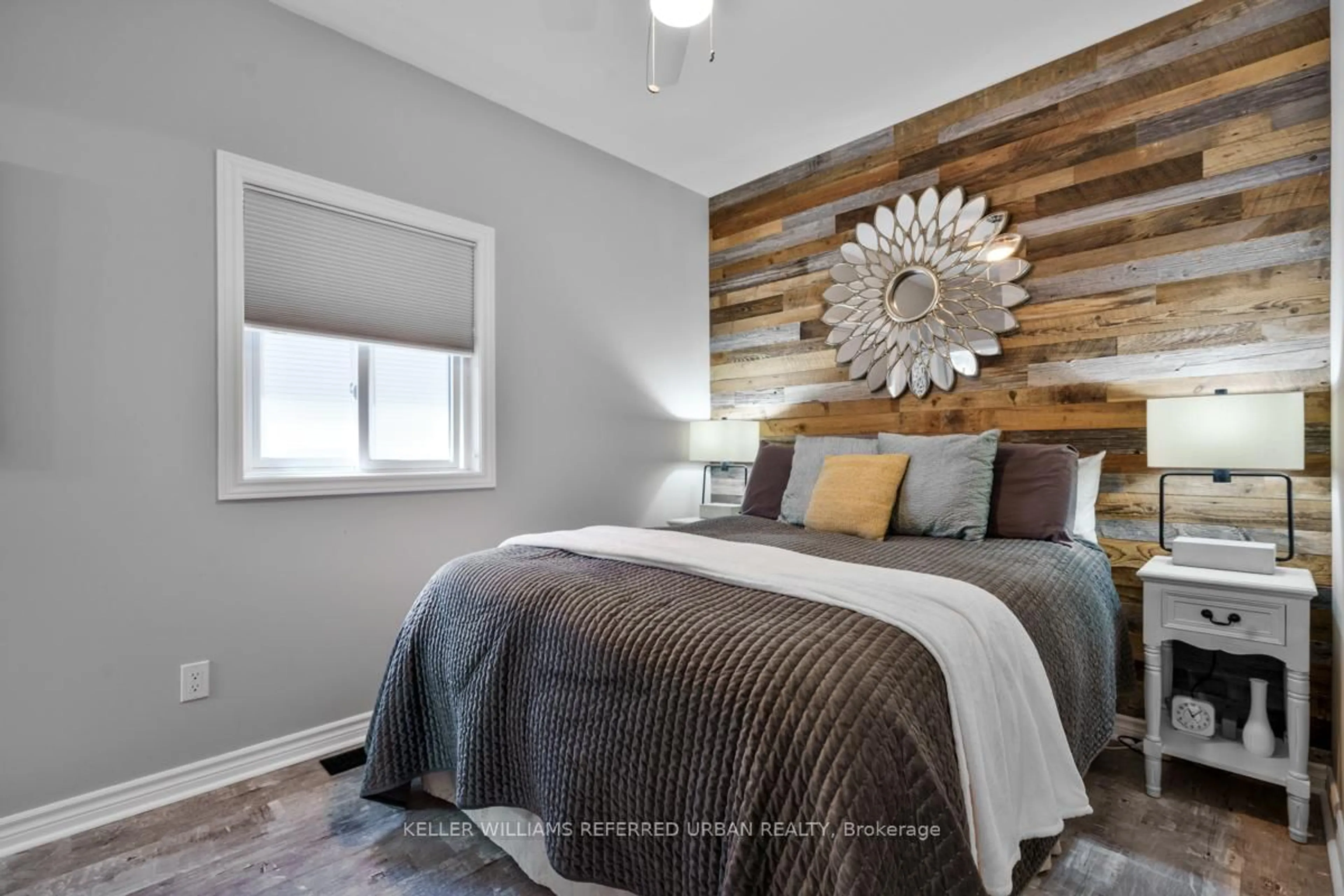 Bedroom with bed, wood/laminate floor for 210 Morrison Ave, Brock Ontario L0K 1A0