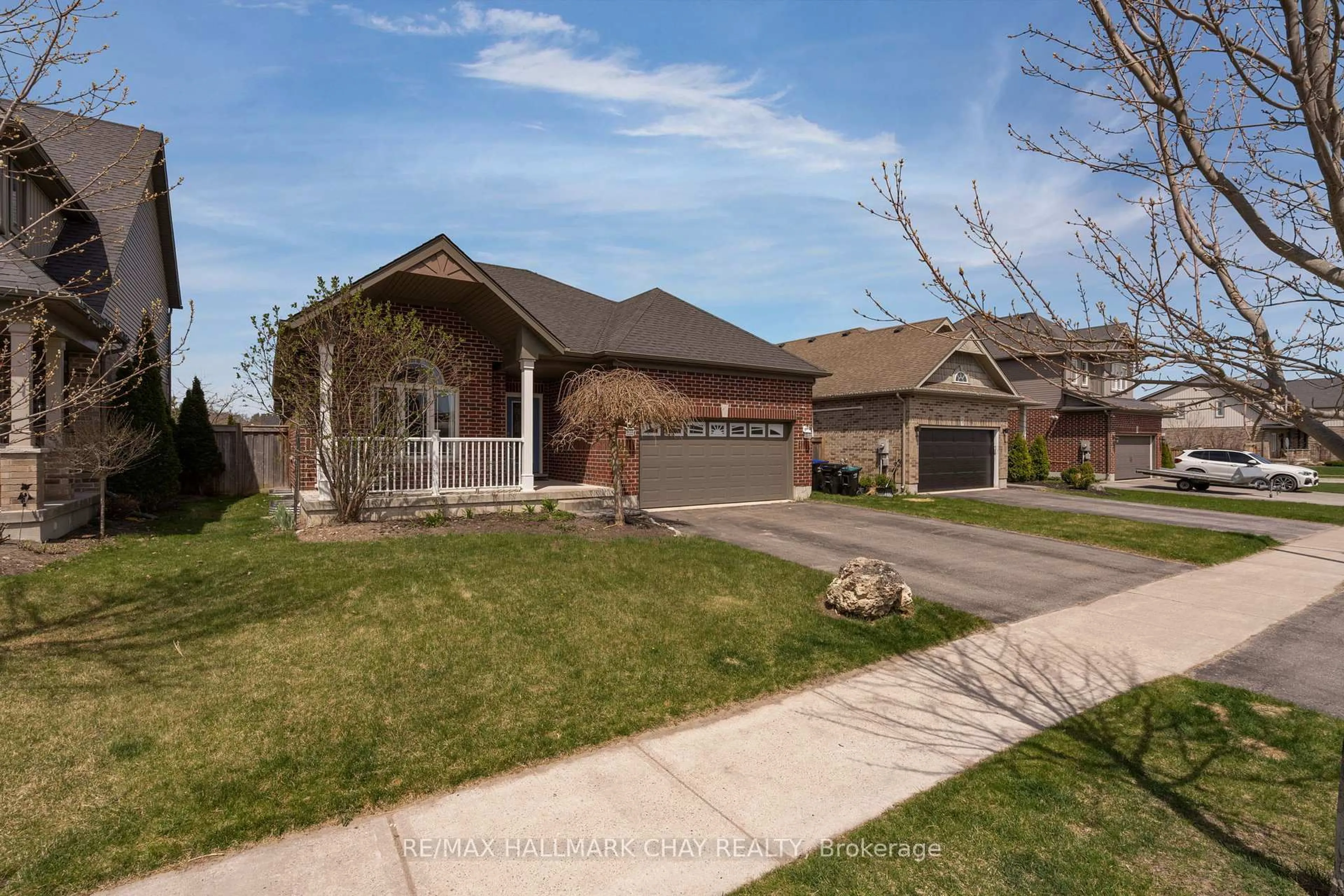 Home with brick exterior material, street for 60 Brownley Lane, Essa Ontario L3W 0P9