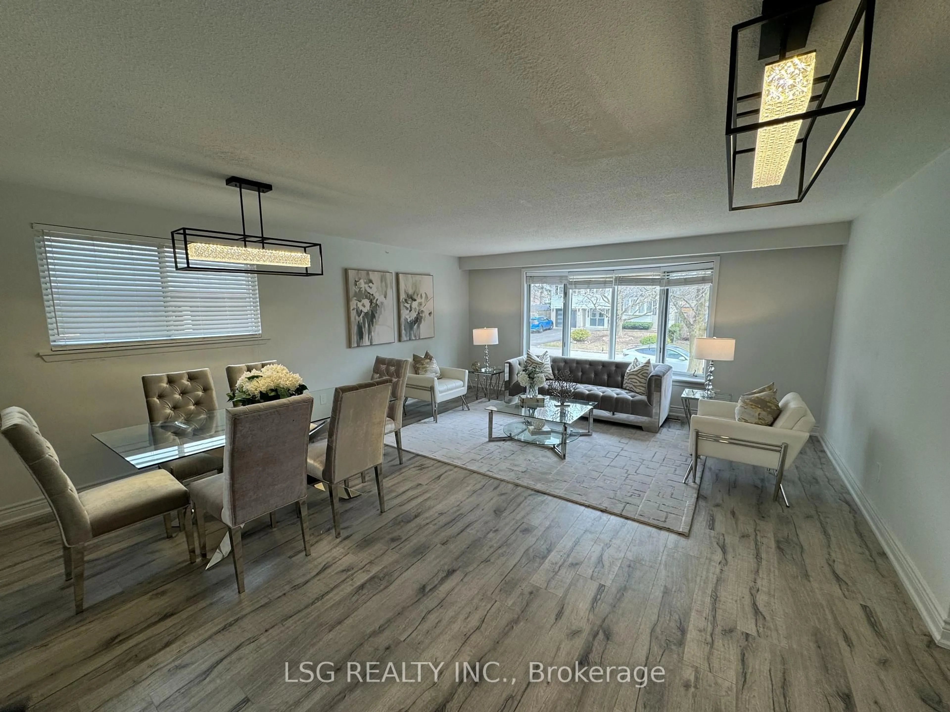 Living room with furniture, wood/laminate floor for 46 Devins Dr, Aurora Ontario L4G 2Z1