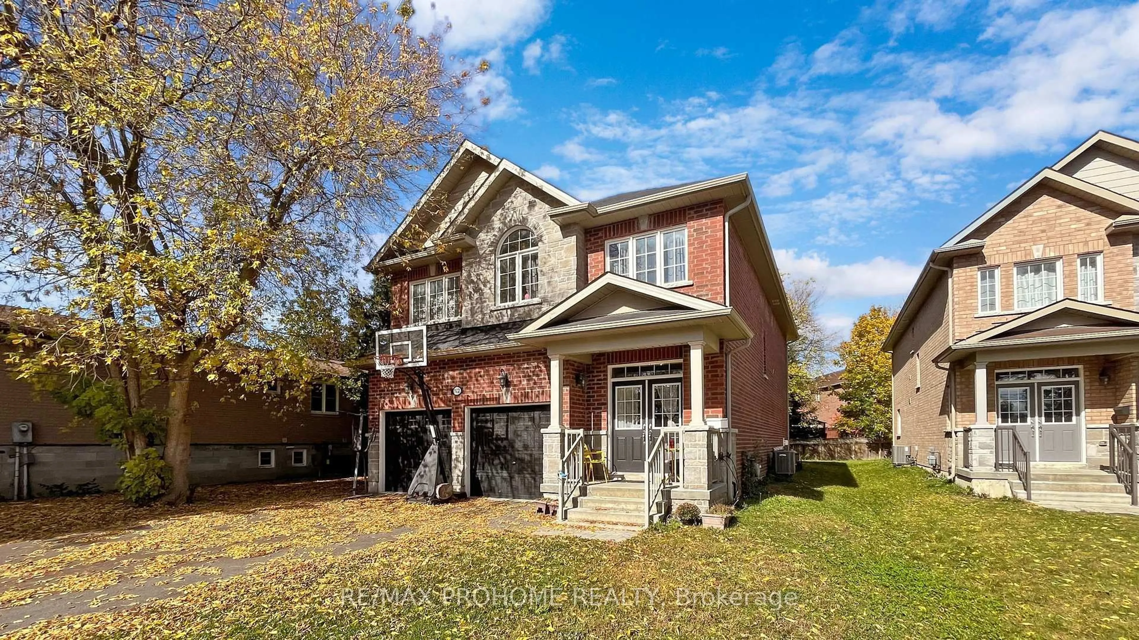 Home with brick exterior material, street for 102 Riveredge Dr, Georgina Ontario L4P 2P1