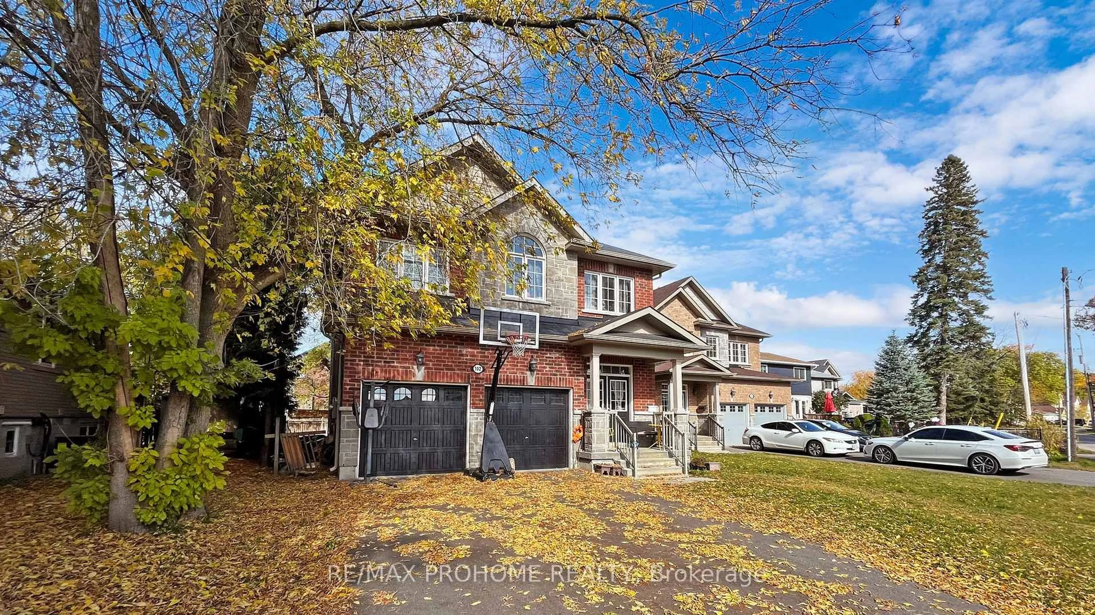 Home with brick exterior material, street for 102 Riveredge Dr, Georgina Ontario L4P 2P1