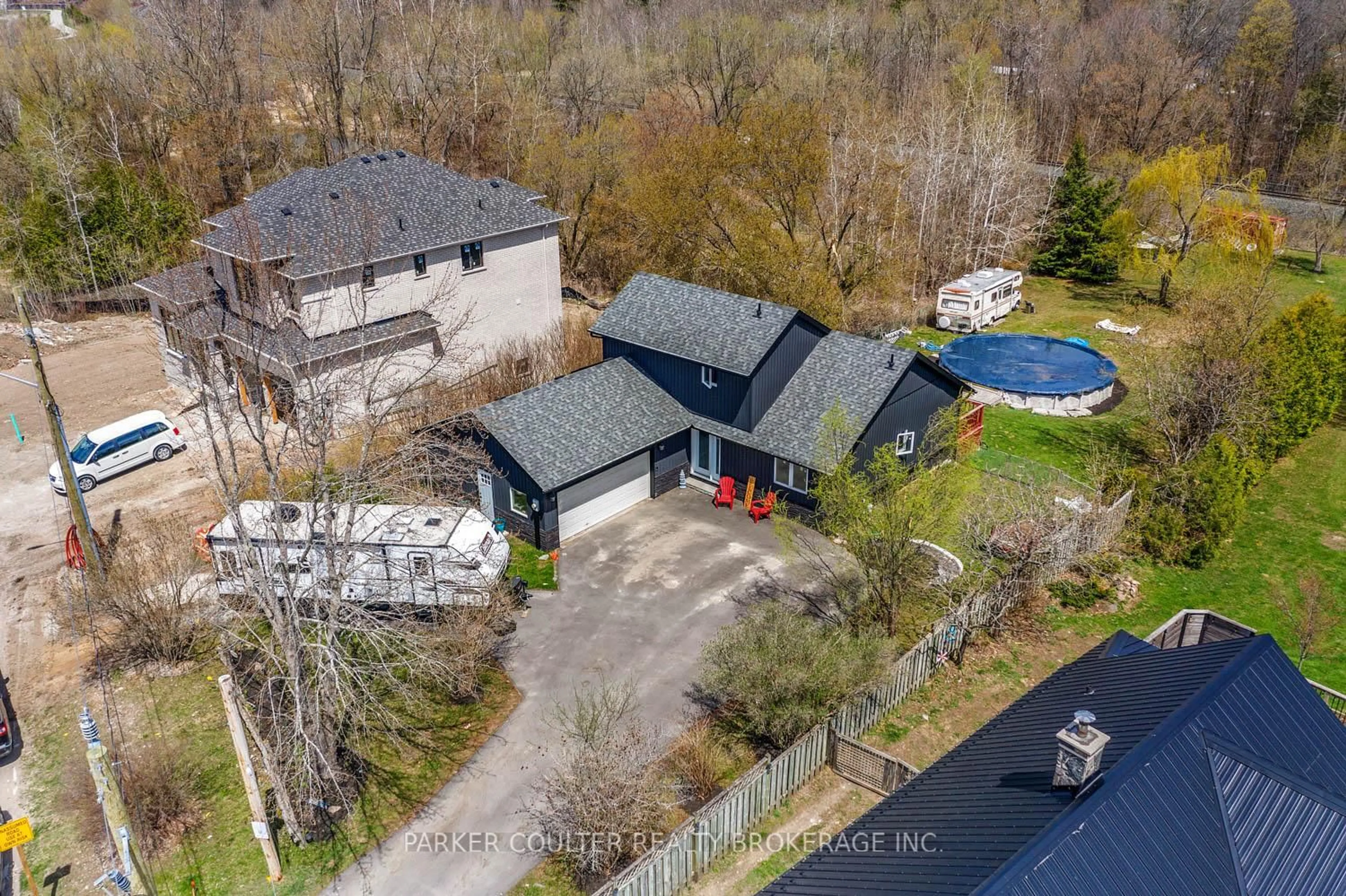 A pic from outside/outdoor area/front of a property/back of a property/a pic from drone, unknown for 973 Church Dr, Innisfil Ontario L0L 1W0