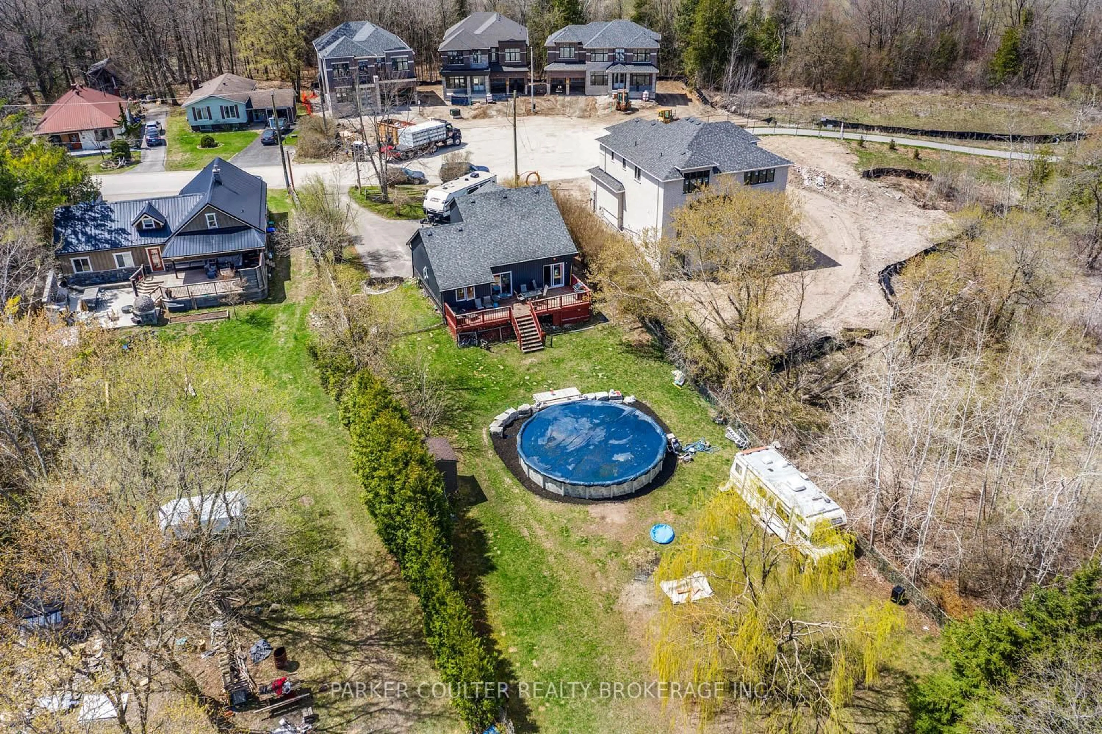 A pic from outside/outdoor area/front of a property/back of a property/a pic from drone, water/lake/river/ocean view for 973 Church Dr, Innisfil Ontario L0L 1W0