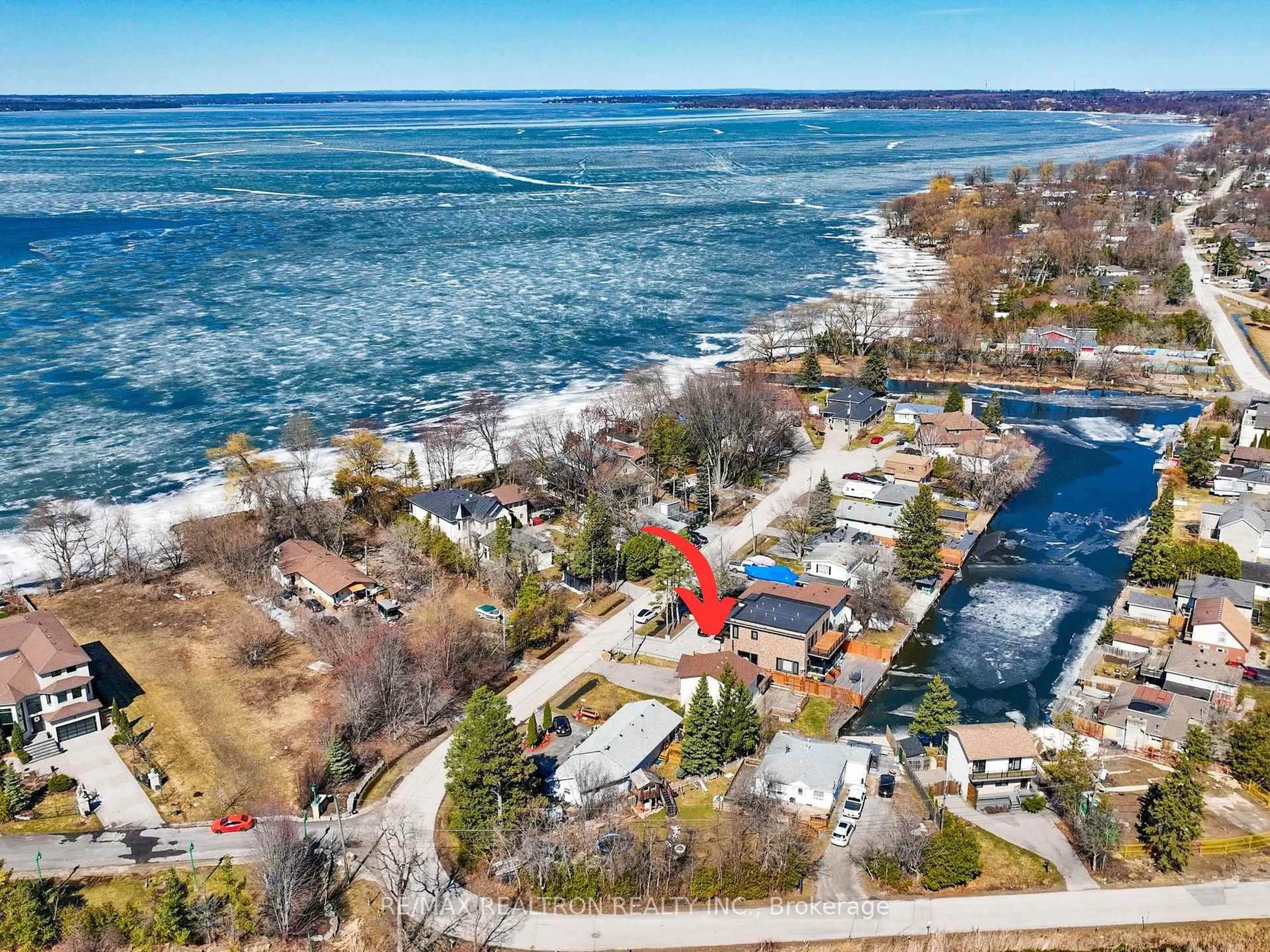 A pic from outside/outdoor area/front of a property/back of a property/a pic from drone, water/lake/river/ocean view for 25 Shirlea Blvd, Georgina Ontario L4P 1L1
