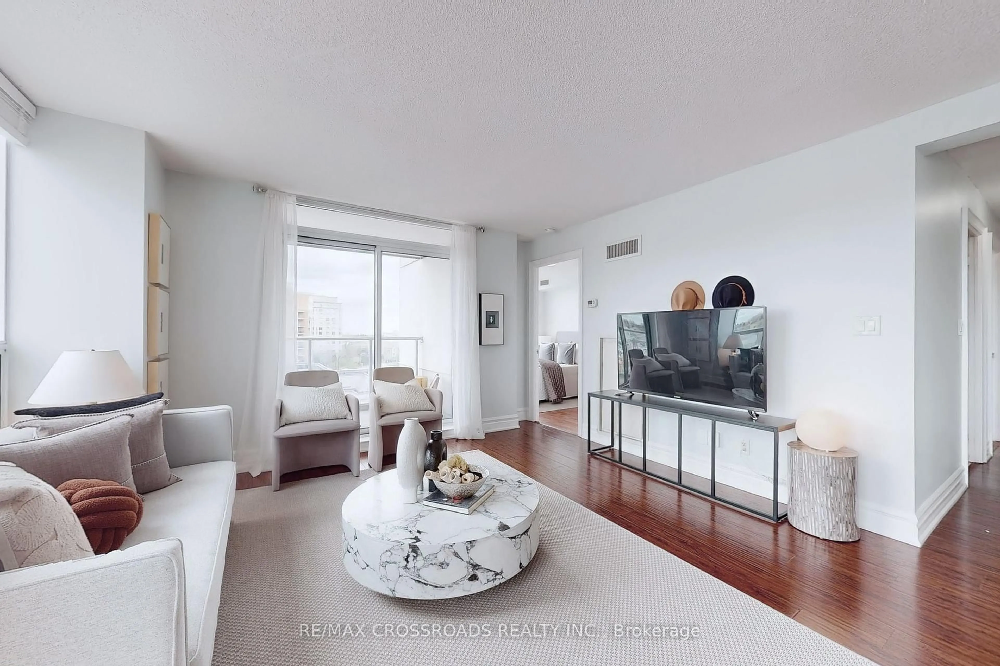 Living room with furniture, unknown for 88 Times Ave #603, Markham Ontario L3T 7Z4