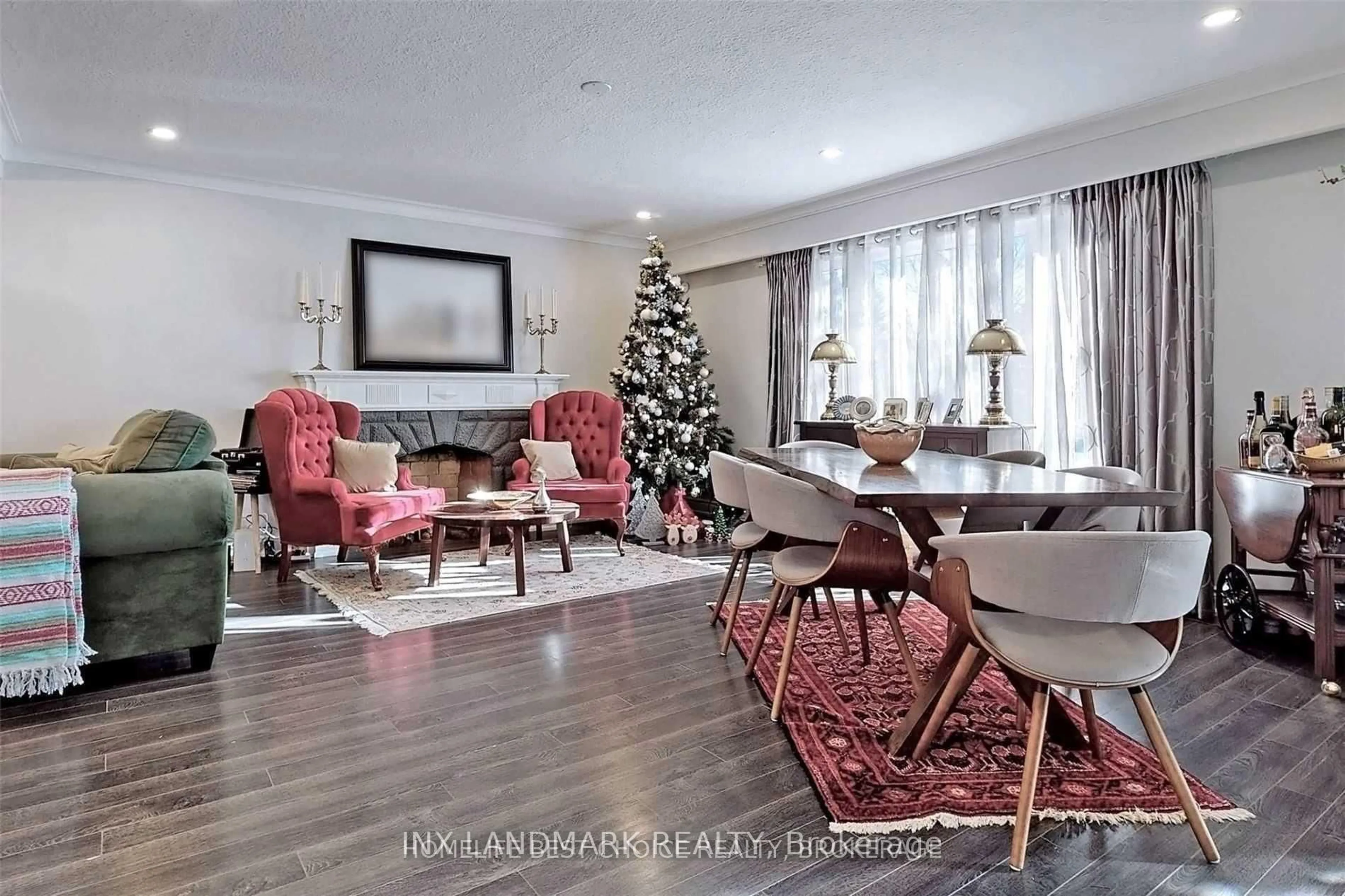 Living room with furniture, wood/laminate floor for 32 Kirk Dr, Markham Ontario L3T 3L1